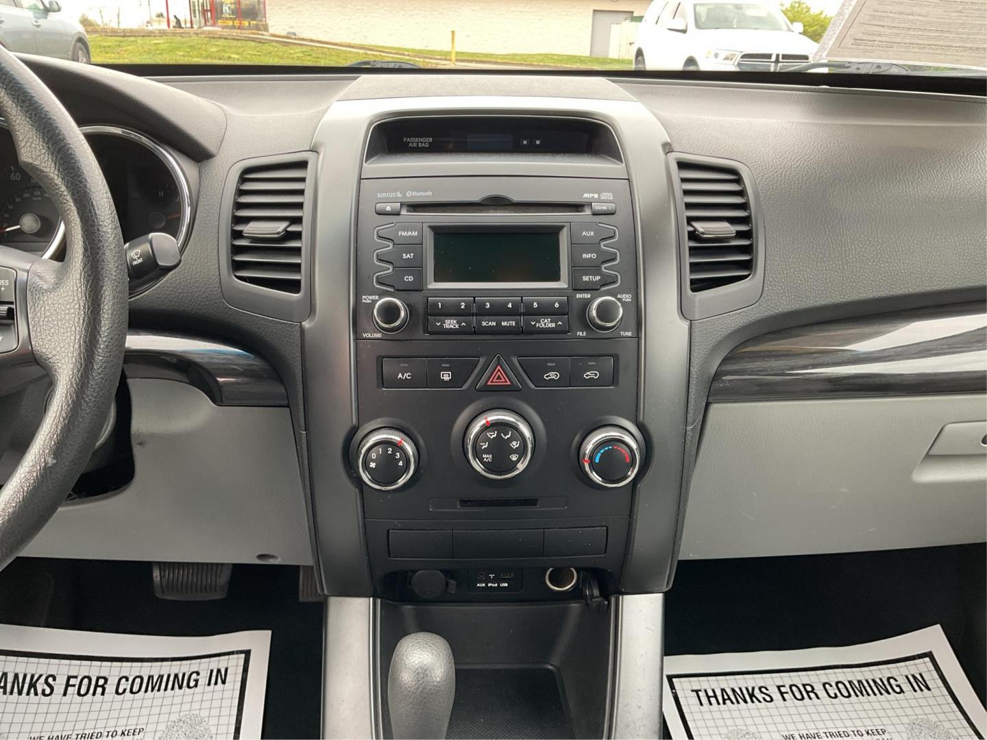 2012 Kia Sorento LX (5XYKTCA68CG) with an 2.4L I-4 gasoline direct injection engine, located at 1184 Kauffman Ave, Fairborn, OH, 45324, (937) 908-9800, 39.807072, -84.031563 - Photo#12