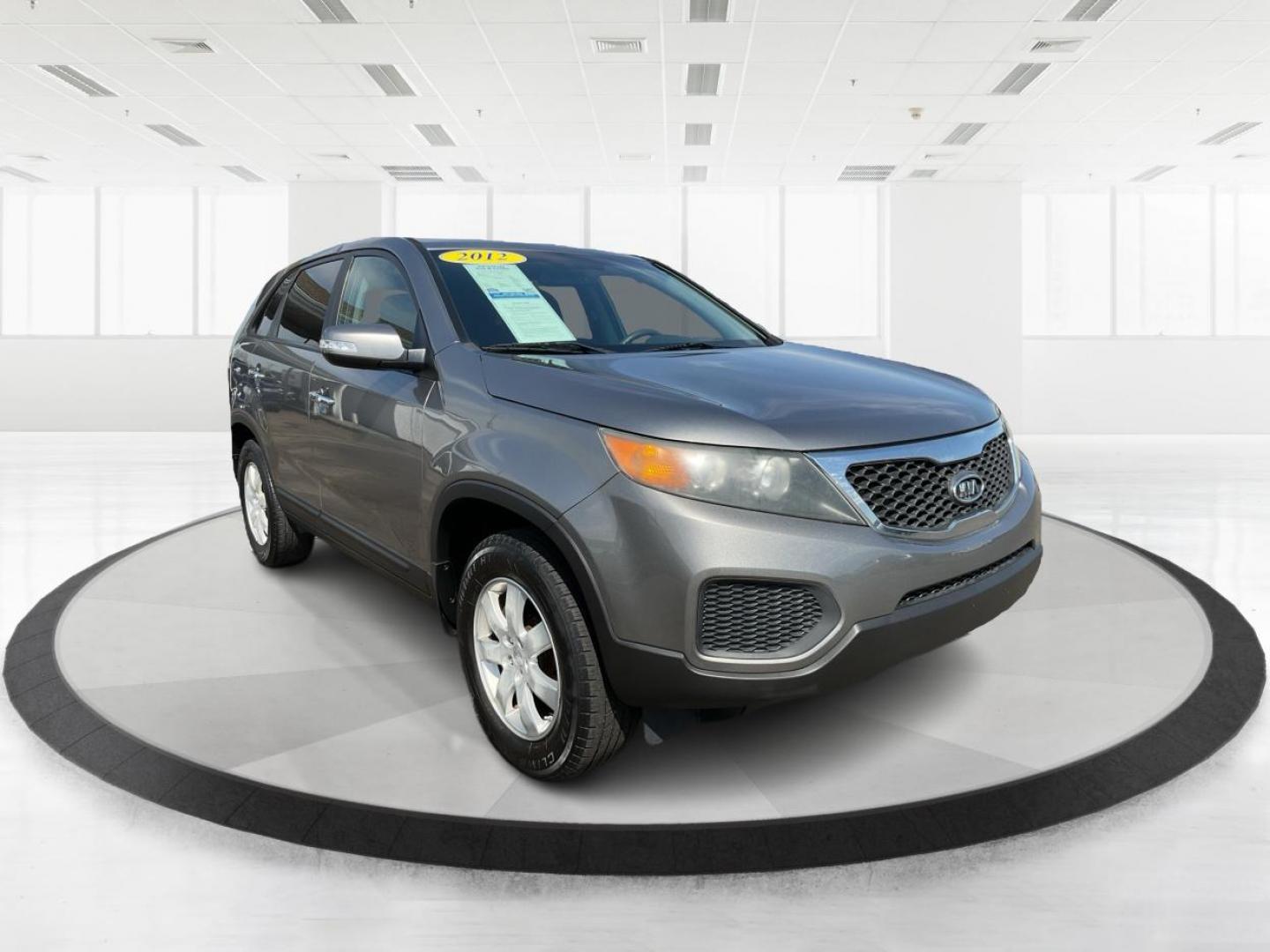 2012 Kia Sorento LX (5XYKT3A17CG) with an 2.4L I-4 DOHC engine, located at 401 Woodman Dr, Riverside, OH, 45431, (937) 908-9800, 39.761024, -84.120956 - Photo#0