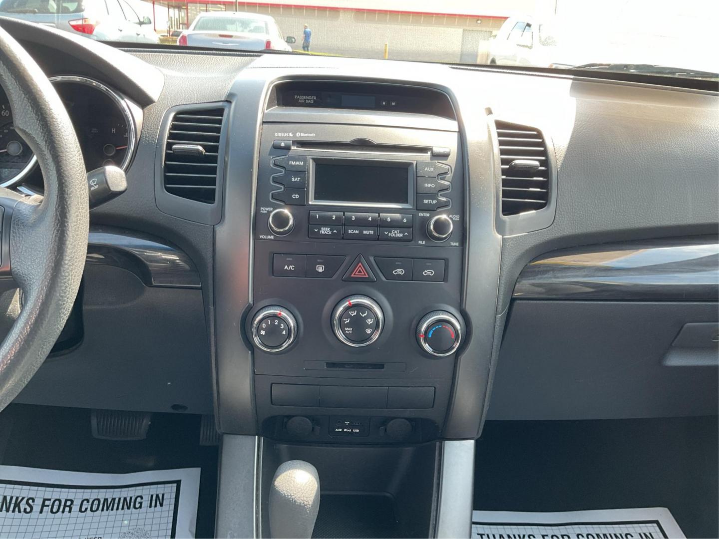 2012 Kia Sorento LX (5XYKT3A17CG) with an 2.4L I-4 DOHC engine, located at 401 Woodman Dr, Riverside, OH, 45431, (937) 908-9800, 39.761024, -84.120956 - Photo#12