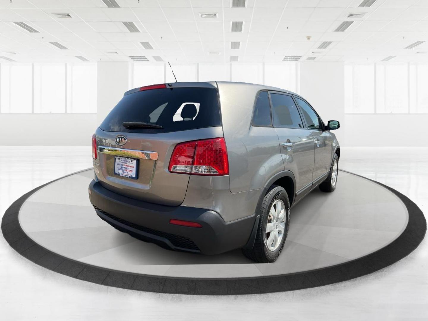 2012 Kia Sorento LX (5XYKT3A17CG) with an 2.4L I-4 DOHC engine, located at 401 Woodman Dr, Riverside, OH, 45431, (937) 908-9800, 39.761024, -84.120956 - Photo#2