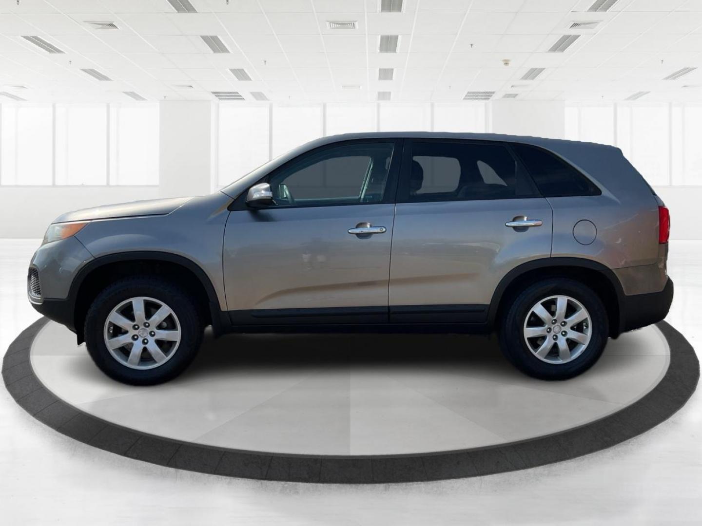 2012 Kia Sorento LX (5XYKT3A17CG) with an 2.4L I-4 DOHC engine, located at 401 Woodman Dr, Riverside, OH, 45431, (937) 908-9800, 39.761024, -84.120956 - Photo#5