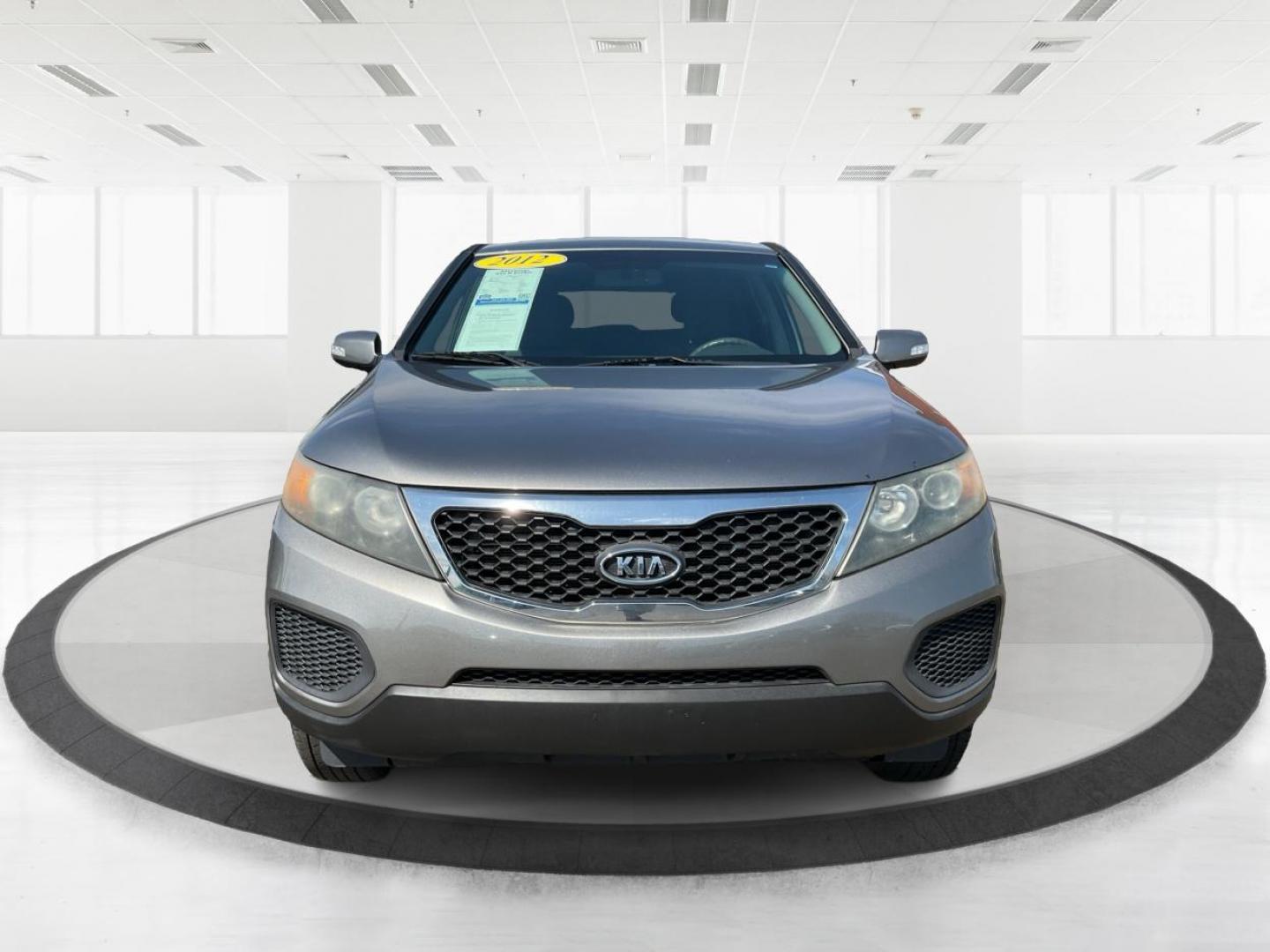 2012 Kia Sorento LX (5XYKT3A17CG) with an 2.4L I-4 DOHC engine, located at 401 Woodman Dr, Riverside, OH, 45431, (937) 908-9800, 39.761024, -84.120956 - Photo#6