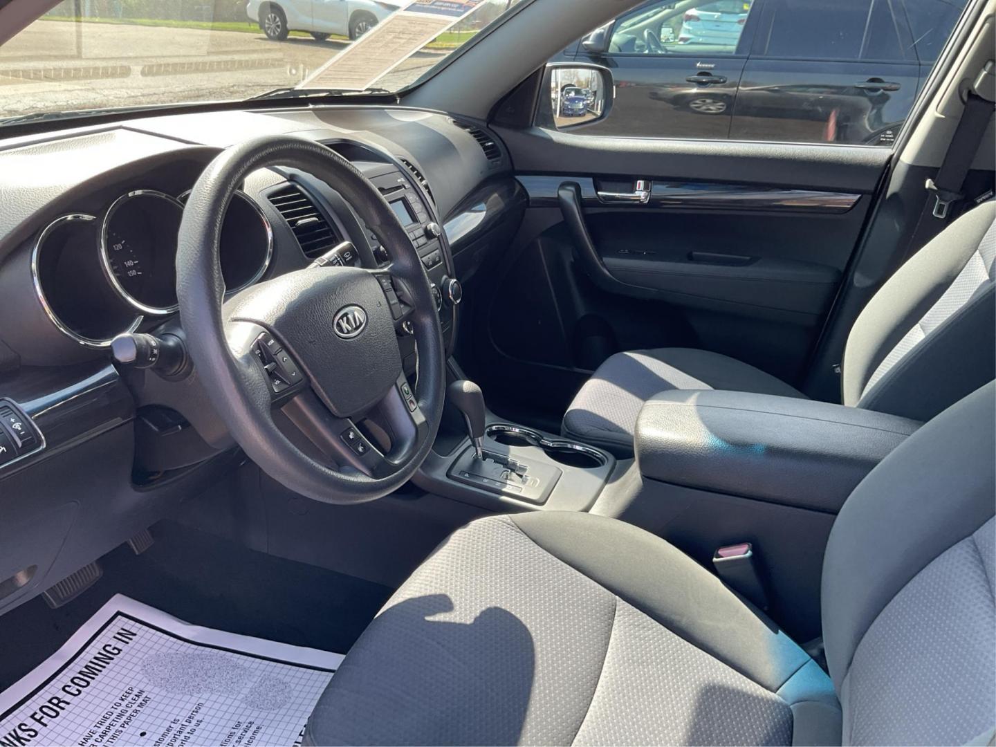 2012 Kia Sorento LX (5XYKT3A17CG) with an 2.4L I-4 DOHC engine, located at 401 Woodman Dr, Riverside, OH, 45431, (937) 908-9800, 39.761024, -84.120956 - Photo#8