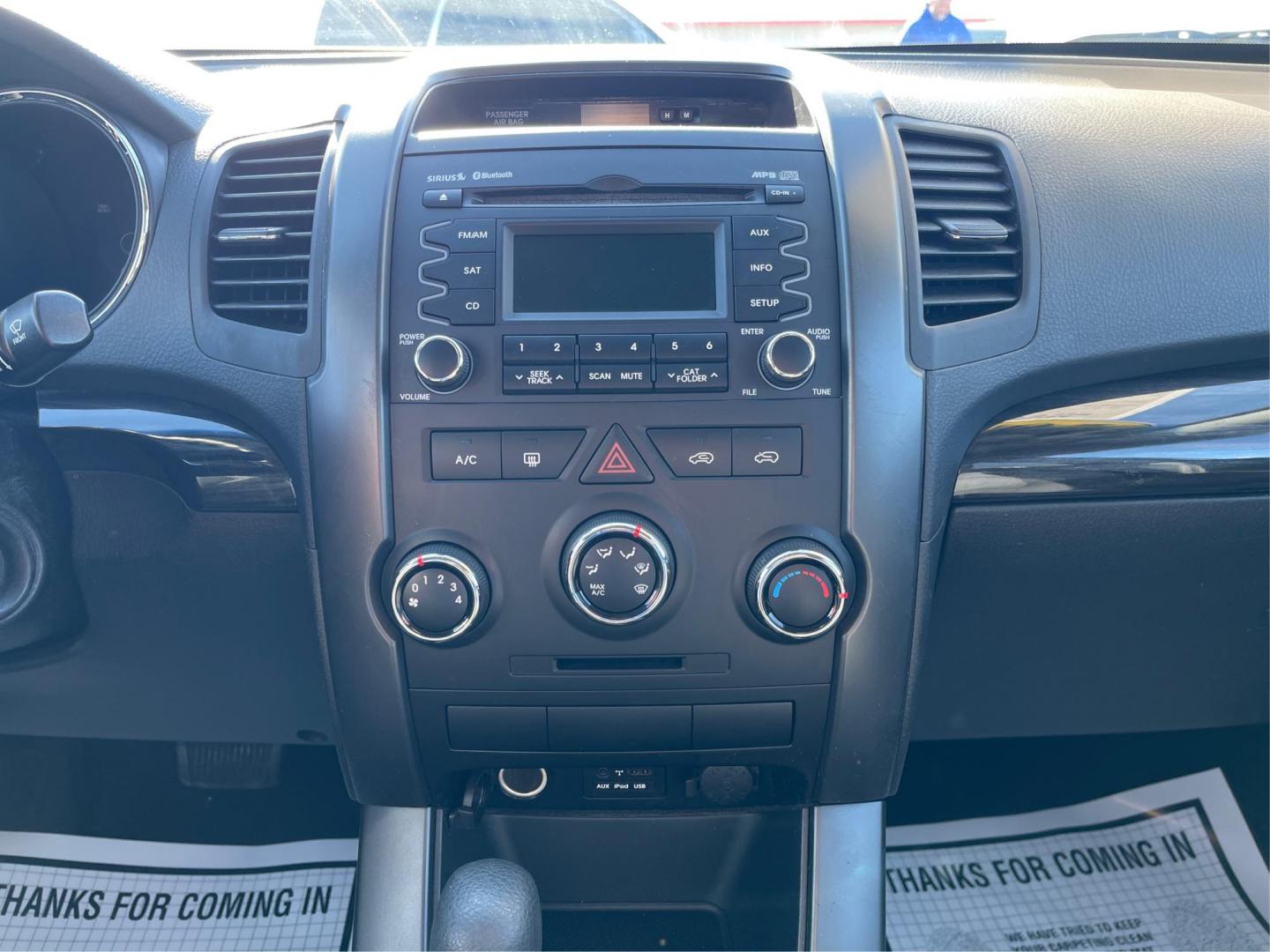 2012 Kia Sorento LX 2WD (5XYKT3A1XCG) with an 2.4L L4 DOHC 16V engine, 6-Speed Automatic transmission, located at 1099 N County Rd 25A , Troy, OH, 45373, (937) 908-9800, 40.057041, -84.215462 - Photo#12