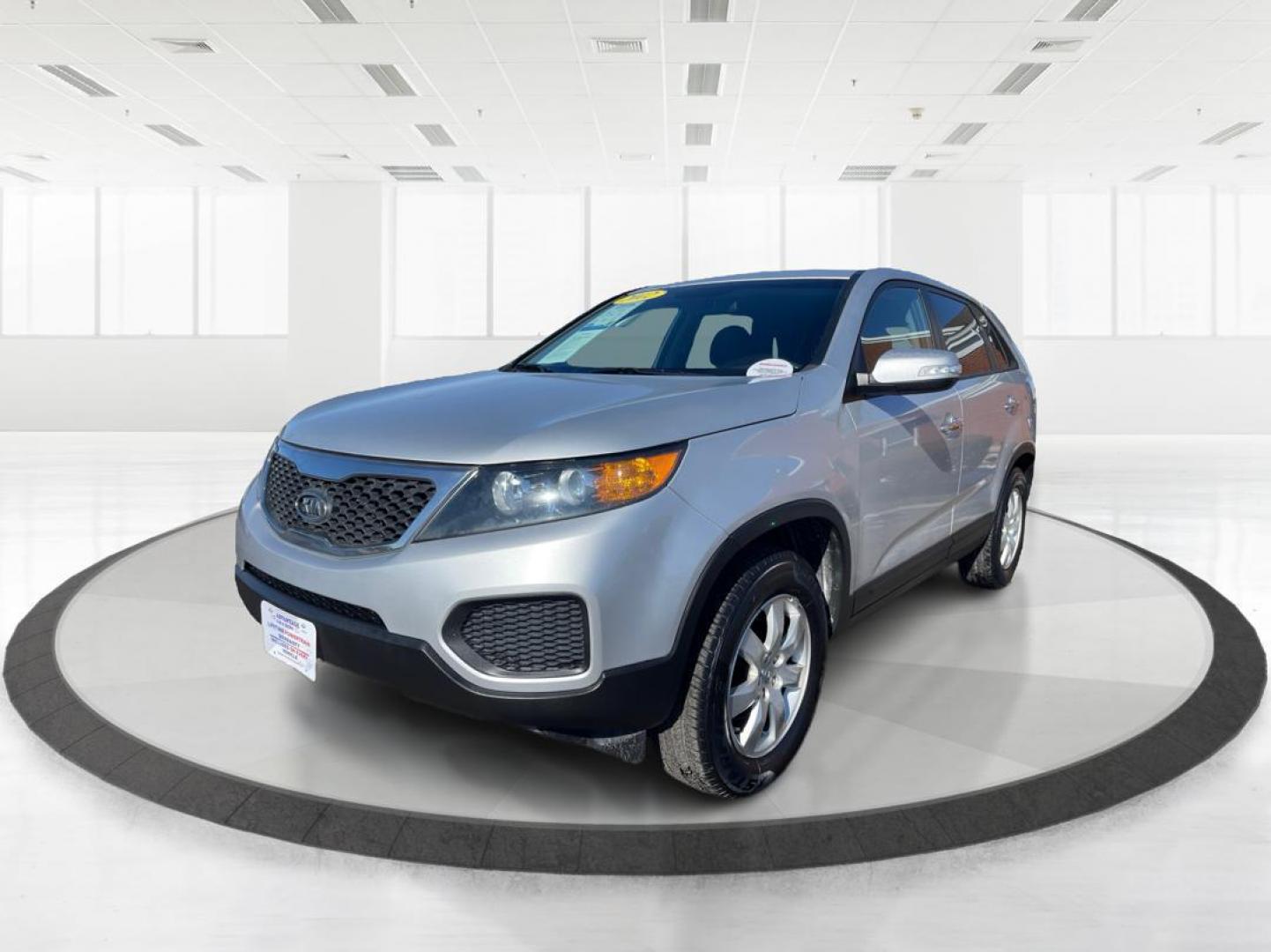 2012 Kia Sorento LX 2WD (5XYKT3A1XCG) with an 2.4L L4 DOHC 16V engine, 6-Speed Automatic transmission, located at 1099 N County Rd 25A , Troy, OH, 45373, (937) 908-9800, 40.057041, -84.215462 - Photo#7