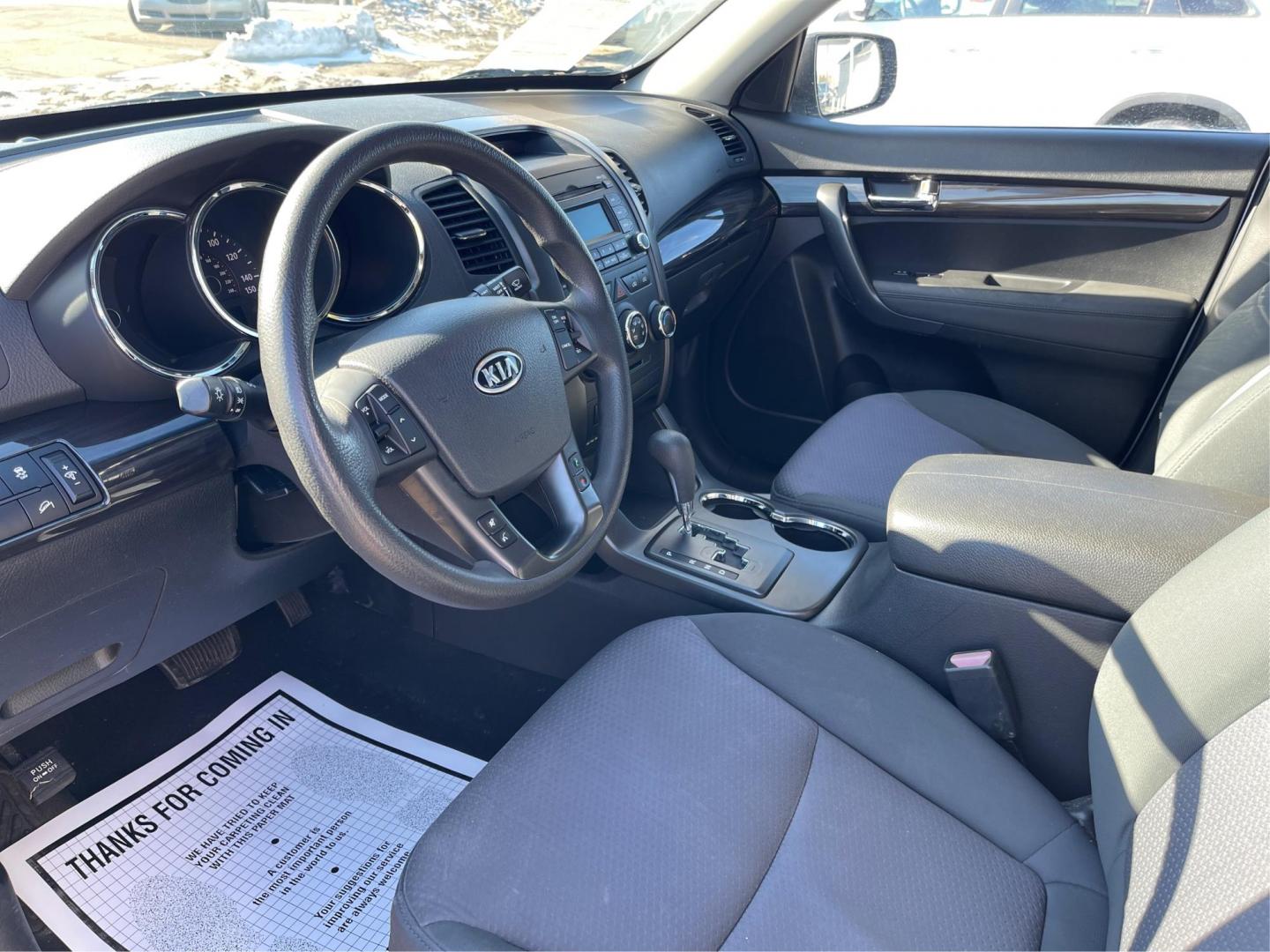 2012 Kia Sorento LX 2WD (5XYKT3A1XCG) with an 2.4L L4 DOHC 16V engine, 6-Speed Automatic transmission, located at 1099 N County Rd 25A , Troy, OH, 45373, (937) 908-9800, 40.057041, -84.215462 - Photo#8