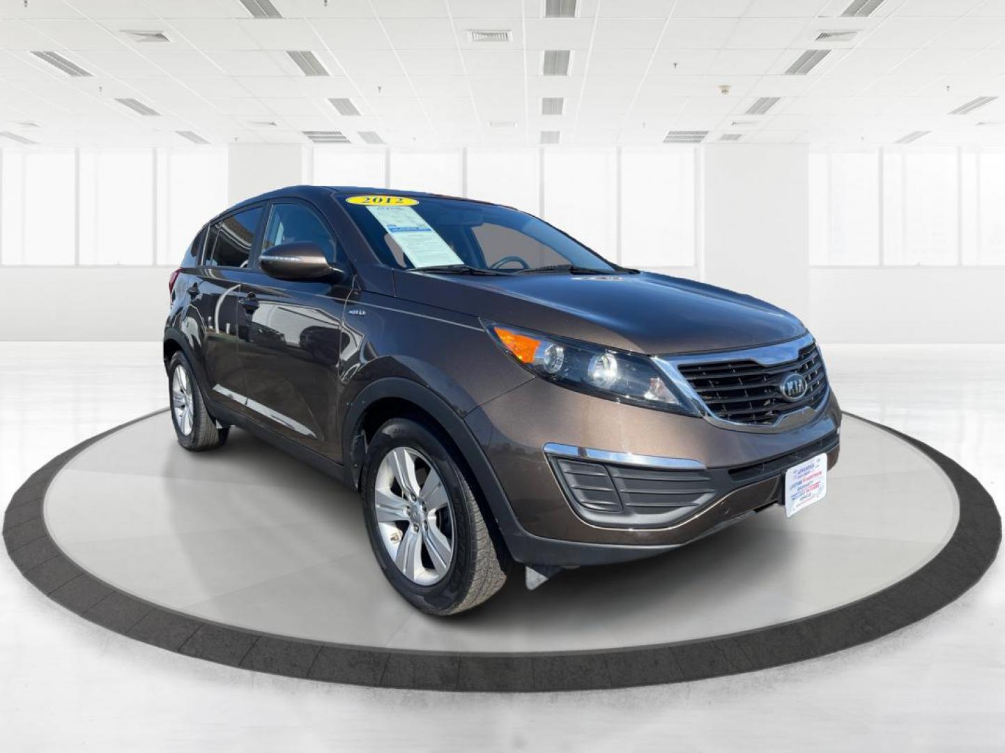 2012 Kia Sportage LX (KNDPBCA20C7) with an 2.4L I-4 DOHC engine, located at 401 Woodman Dr, Riverside, OH, 45431, (937) 908-9800, 39.761024, -84.120956 - Photo#0