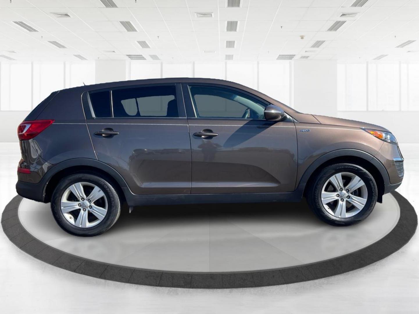 2012 Kia Sportage LX (KNDPBCA20C7) with an 2.4L I-4 DOHC engine, located at 401 Woodman Dr, Riverside, OH, 45431, (937) 908-9800, 39.761024, -84.120956 - Photo#1