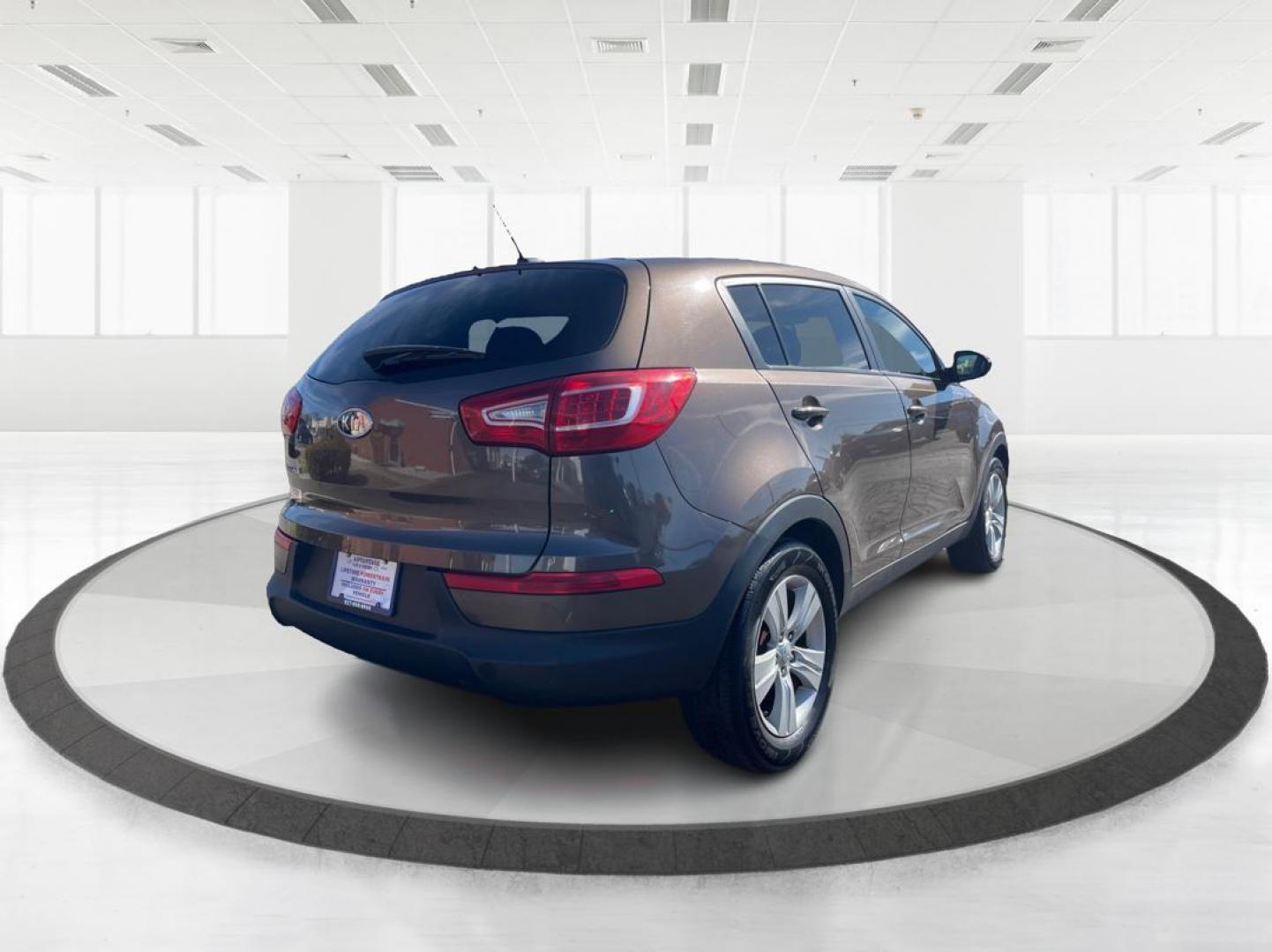 2012 Kia Sportage LX (KNDPBCA20C7) with an 2.4L I-4 DOHC engine, located at 401 Woodman Dr, Riverside, OH, 45431, (937) 908-9800, 39.761024, -84.120956 - Photo#2