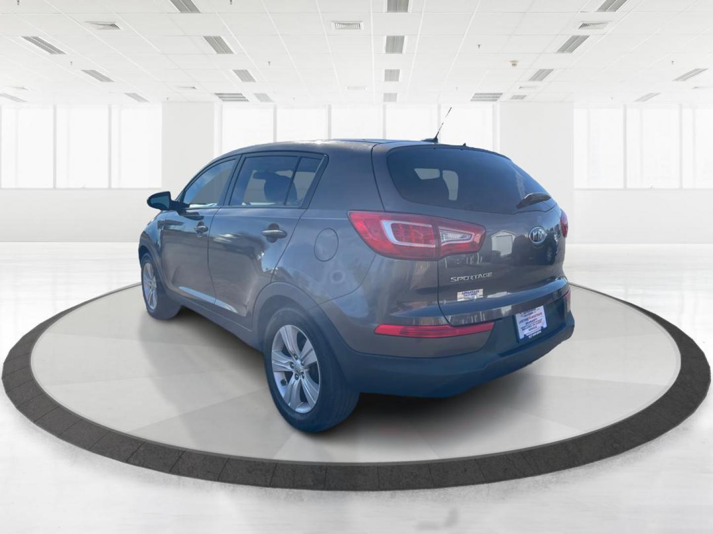 2012 Kia Sportage LX (KNDPBCA20C7) with an 2.4L I-4 DOHC engine, located at 401 Woodman Dr, Riverside, OH, 45431, (937) 908-9800, 39.761024, -84.120956 - Photo#4