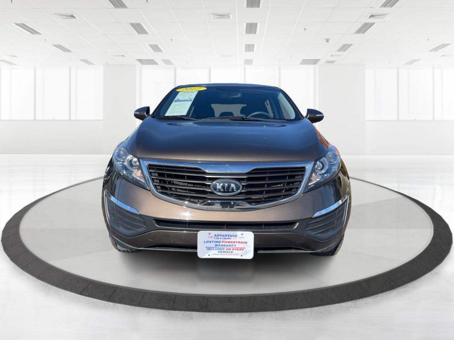 2012 Kia Sportage LX (KNDPBCA20C7) with an 2.4L I-4 DOHC engine, located at 401 Woodman Dr, Riverside, OH, 45431, (937) 908-9800, 39.761024, -84.120956 - Photo#6