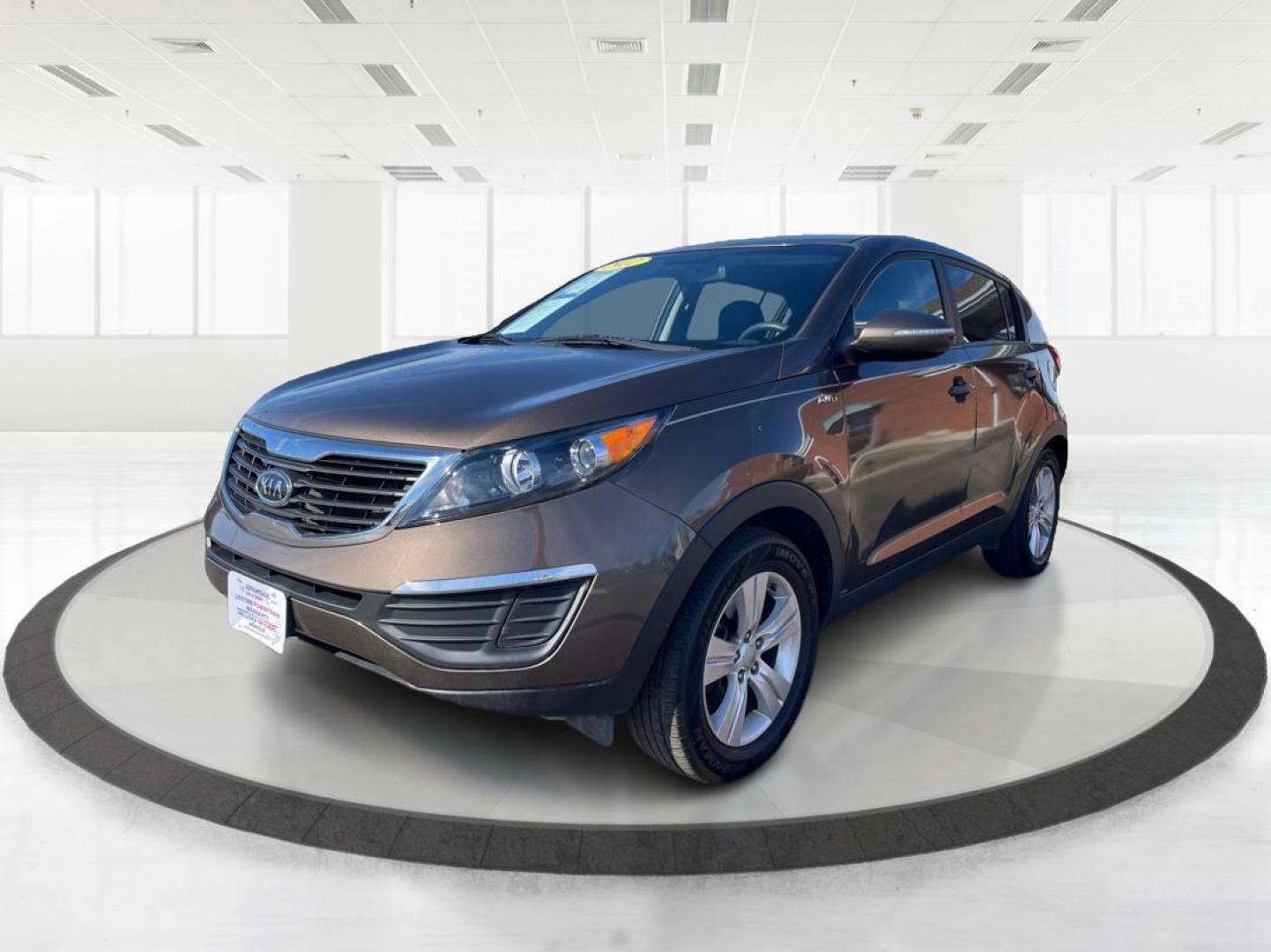 2012 Kia Sportage LX (KNDPBCA20C7) with an 2.4L I-4 DOHC engine, located at 401 Woodman Dr, Riverside, OH, 45431, (937) 908-9800, 39.761024, -84.120956 - Photo#7
