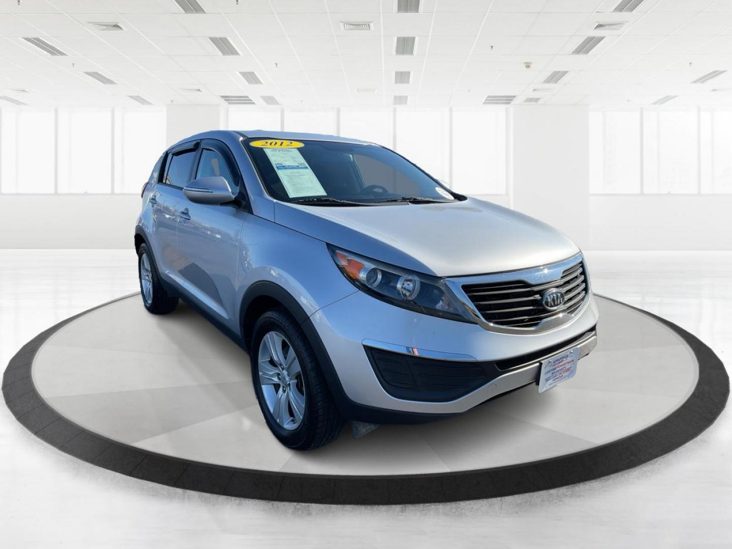 2012 Kia Sportage LX (KNDPB3A21C7) with an 2.4L I-4 DOHC engine, located at 401 Woodman Dr, Riverside, OH, 45431, (937) 908-9800, 39.761024, -84.120956 - Photo#0