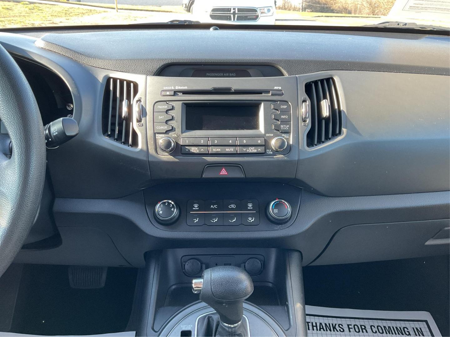 2012 Kia Sportage LX (KNDPB3A21C7) with an 2.4L I-4 DOHC engine, located at 401 Woodman Dr, Riverside, OH, 45431, (937) 908-9800, 39.761024, -84.120956 - Photo#12