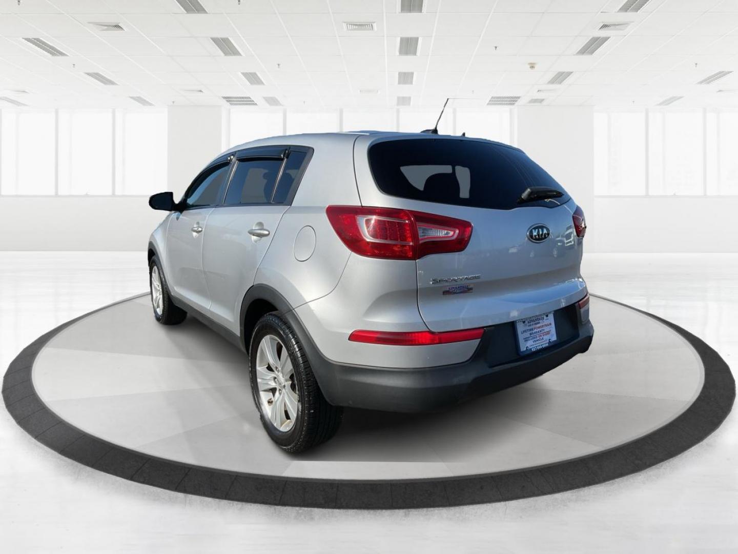 2012 Kia Sportage LX (KNDPB3A21C7) with an 2.4L I-4 DOHC engine, located at 401 Woodman Dr, Riverside, OH, 45431, (937) 908-9800, 39.761024, -84.120956 - Photo#4