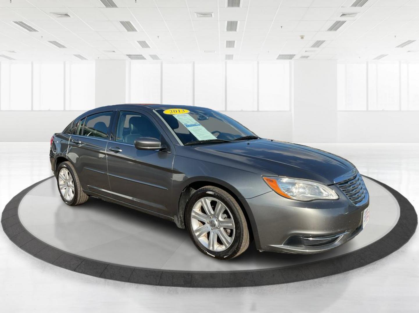 2013 Chrysler 200 Touring (1C3CCBBG0DN) with an 2.4L I-4 DOHC engine, located at 401 Woodman Dr, Riverside, OH, 45431, (937) 908-9800, 39.761024, -84.120956 - Photo#0