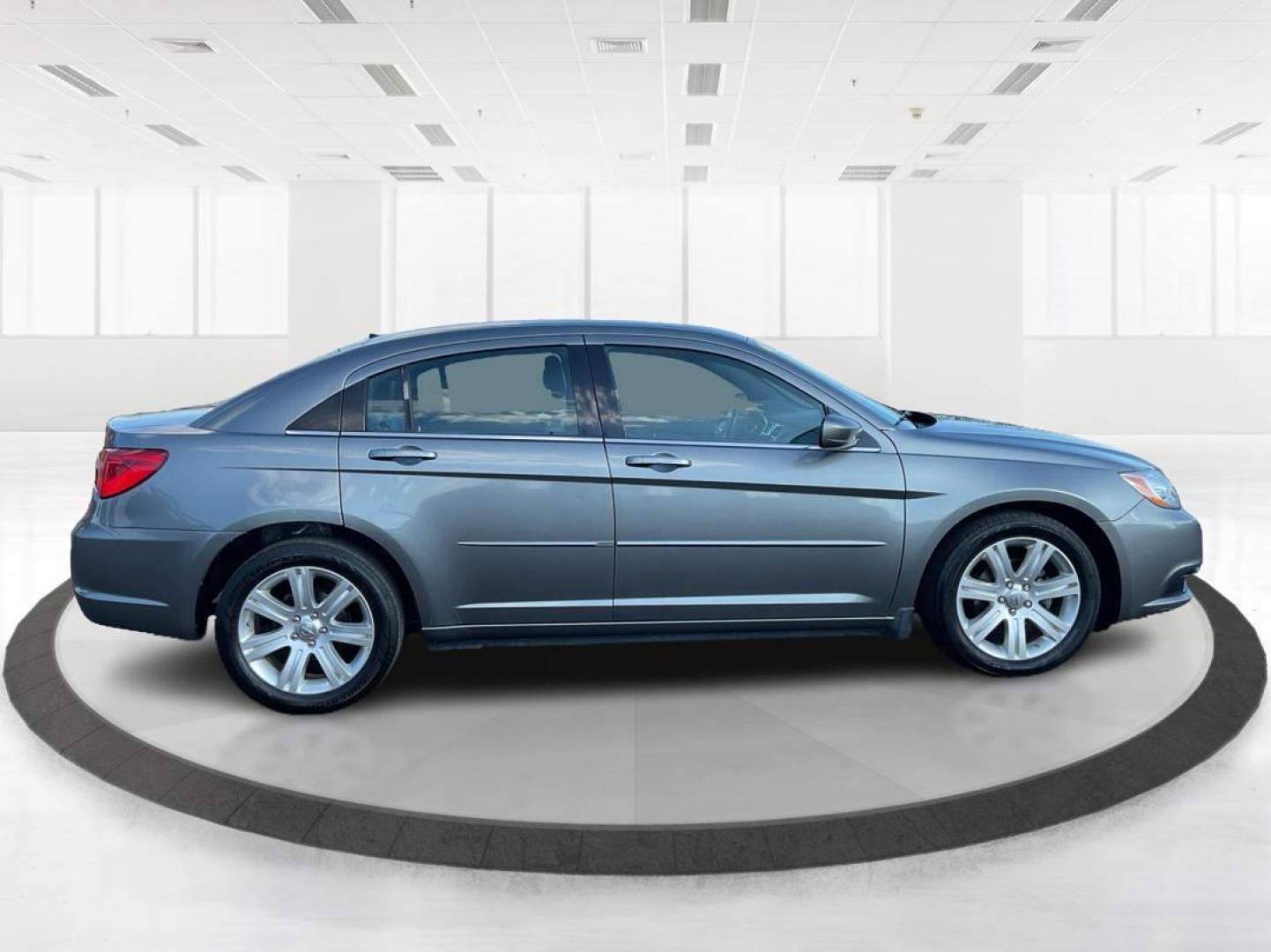 2013 Chrysler 200 Touring (1C3CCBBG0DN) with an 2.4L I-4 DOHC engine, located at 401 Woodman Dr, Riverside, OH, 45431, (937) 908-9800, 39.761024, -84.120956 - Photo#1