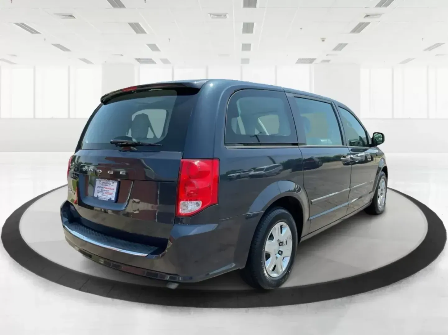2013 Dodge Grand Caravan SE (2C4RDGBG2DR) with an 3.6L V6 DOHC 24V engine, 6-Speed Automatic transmission, located at 401 Woodman Dr, Riverside, OH, 45431, (937) 908-9800, 39.761024, -84.120956 - Photo#2