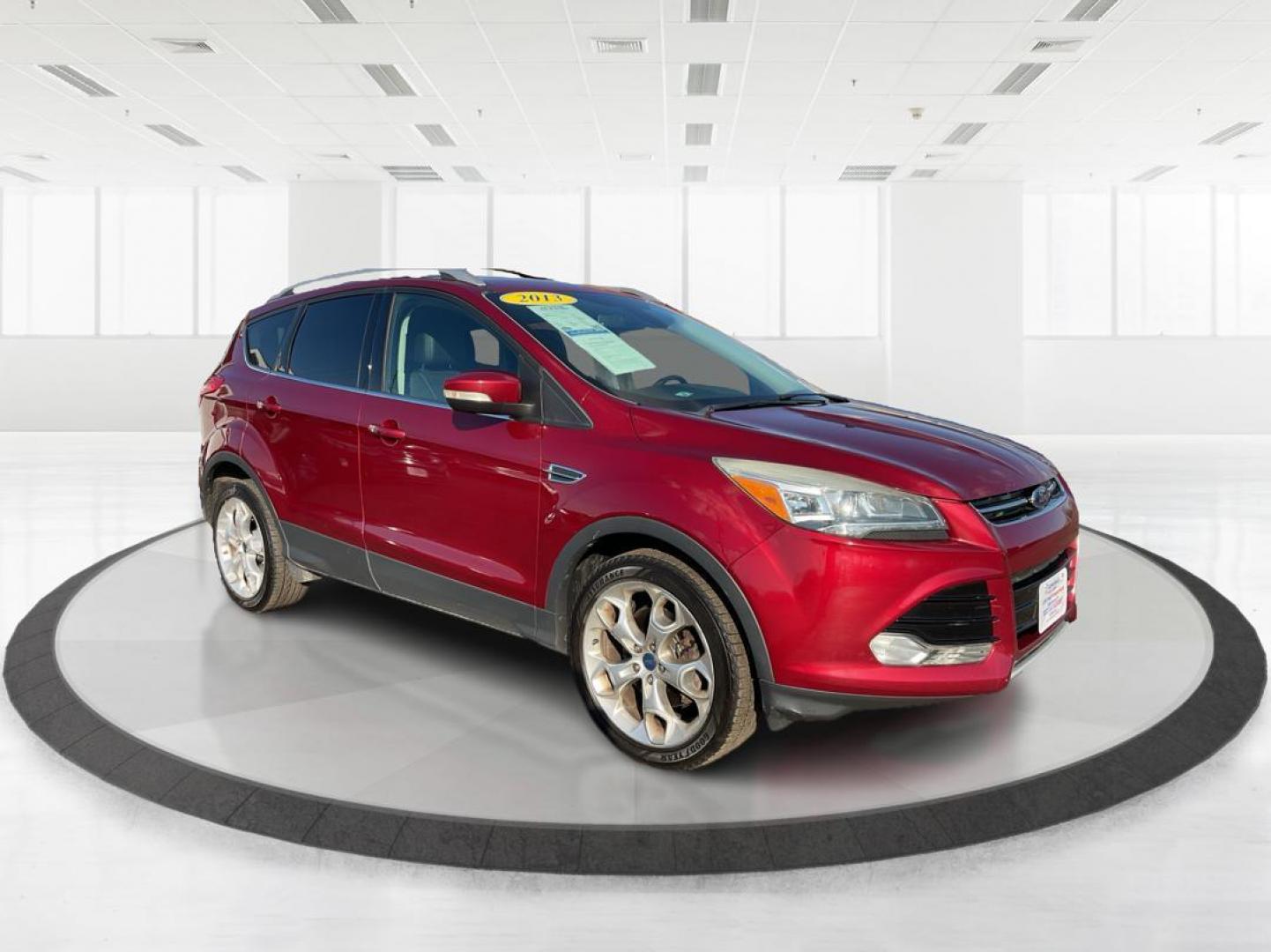2013 Ford Escape Titanium (1FMCU0J94DU) with an EcoBoost 2L I-4 gasoline direct injection engine, located at 4508 South Dixie Dr, Moraine, OH, 45439, (937) 908-9800, 39.807072, -84.031563 - Photo#0