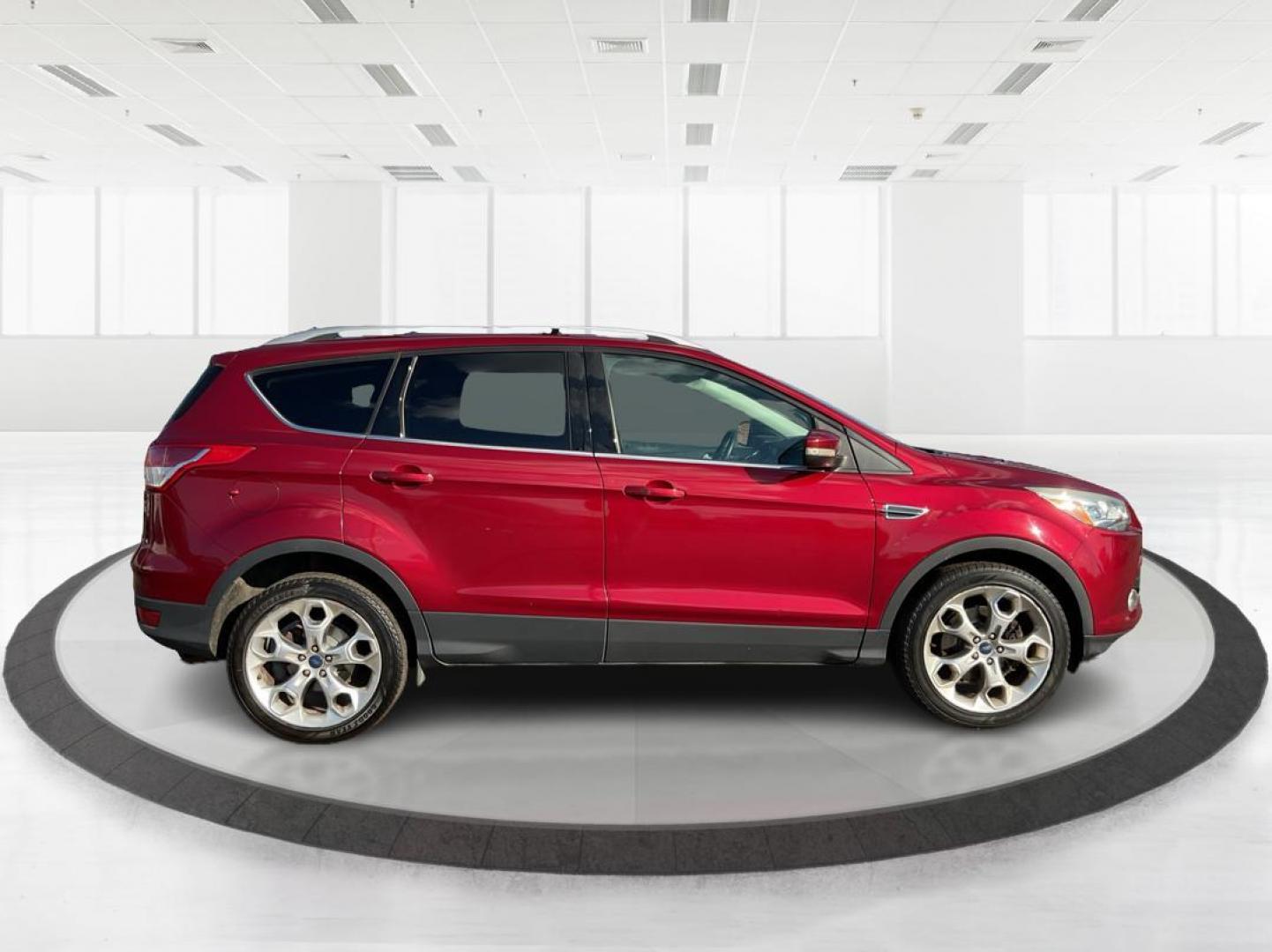2013 Ford Escape Titanium (1FMCU0J94DU) with an EcoBoost 2L I-4 gasoline direct injection engine, located at 4508 South Dixie Dr, Moraine, OH, 45439, (937) 908-9800, 39.807072, -84.031563 - Photo#1