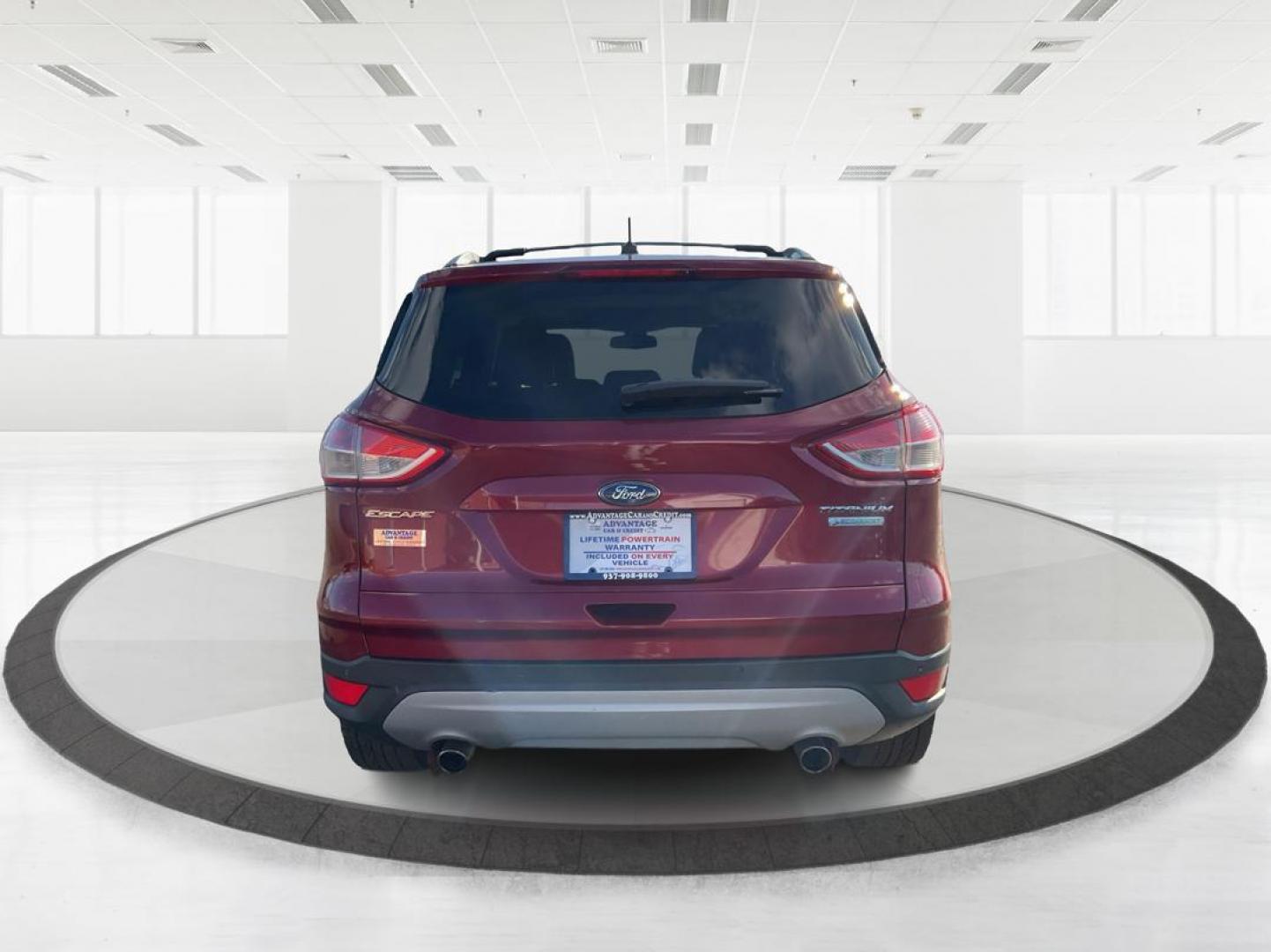2013 Ford Escape Titanium (1FMCU0J94DU) with an EcoBoost 2L I-4 gasoline direct injection engine, located at 4508 South Dixie Dr, Moraine, OH, 45439, (937) 908-9800, 39.807072, -84.031563 - Photo#2