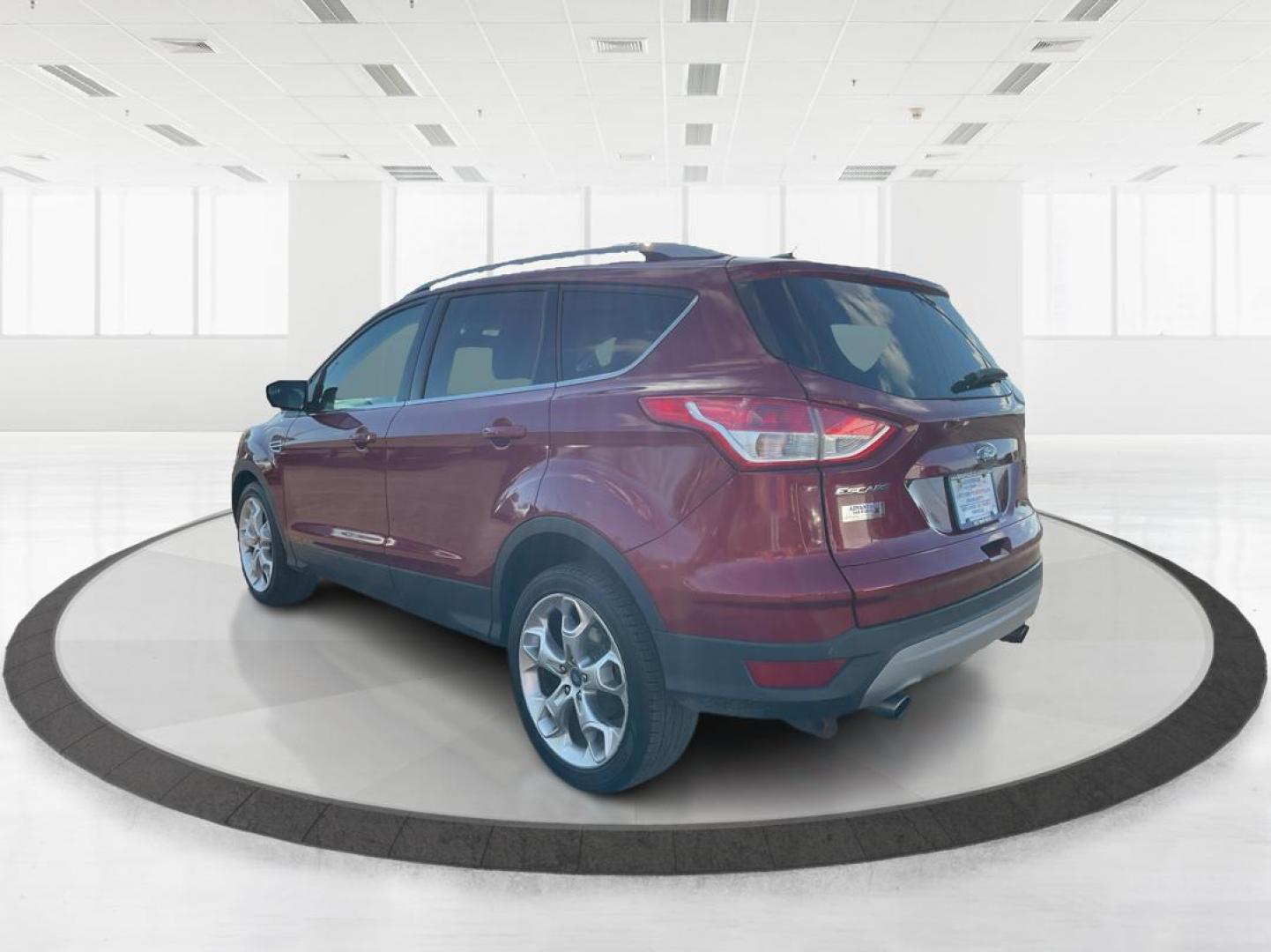 2013 Ford Escape Titanium (1FMCU0J94DU) with an EcoBoost 2L I-4 gasoline direct injection engine, located at 4508 South Dixie Dr, Moraine, OH, 45439, (937) 908-9800, 39.807072, -84.031563 - Photo#3