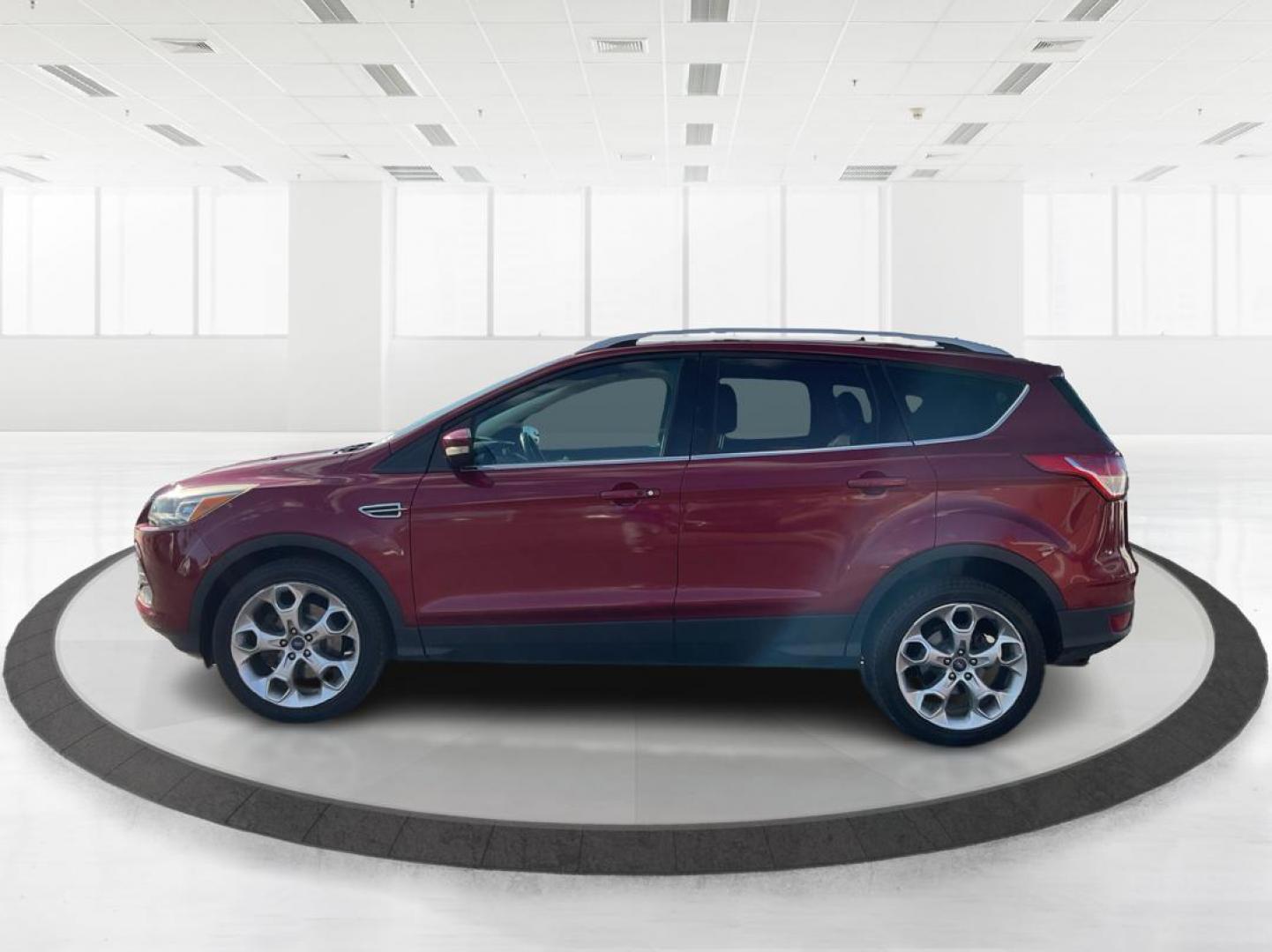 2013 Ford Escape Titanium (1FMCU0J94DU) with an EcoBoost 2L I-4 gasoline direct injection engine, located at 4508 South Dixie Dr, Moraine, OH, 45439, (937) 908-9800, 39.807072, -84.031563 - Photo#4