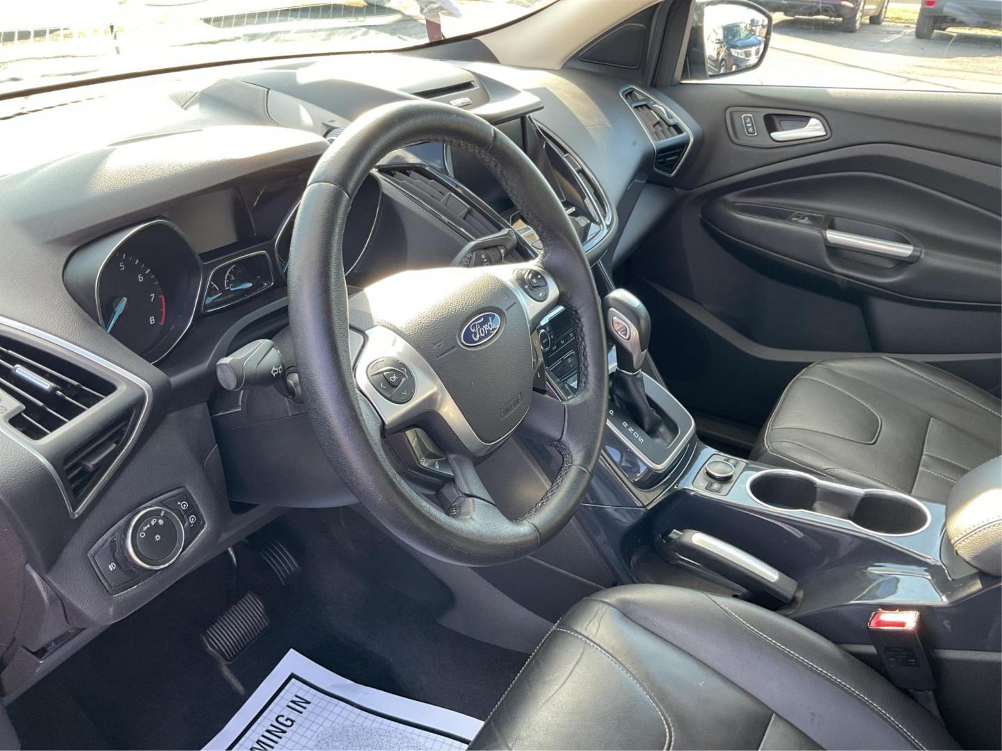 2013 Ford Escape Titanium (1FMCU0J94DU) with an EcoBoost 2L I-4 gasoline direct injection engine, located at 4508 South Dixie Dr, Moraine, OH, 45439, (937) 908-9800, 39.807072, -84.031563 - Photo#7
