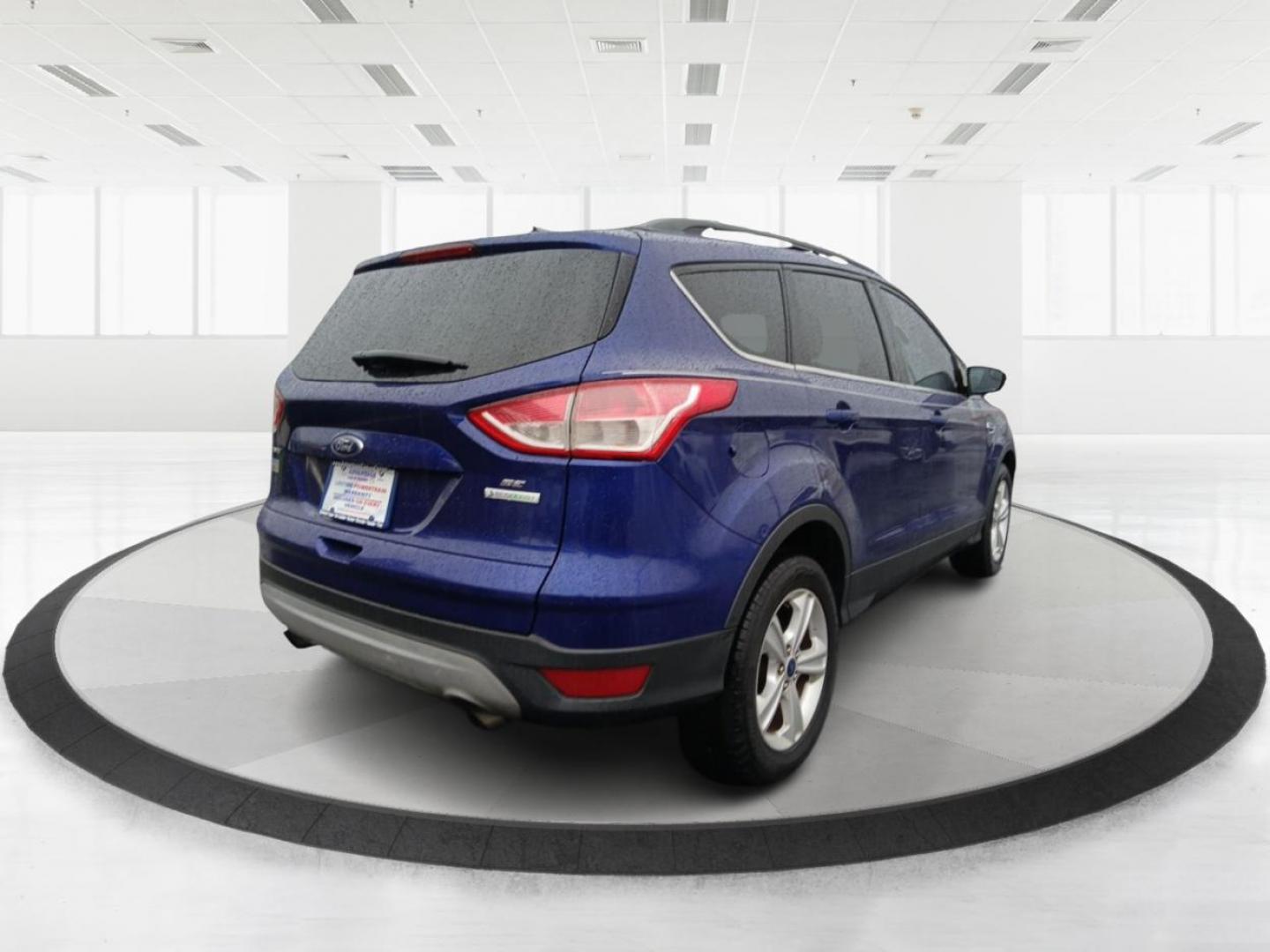 2013 Ford Escape SE FWD (1FMCU0G93DU) with an 2.0L L4 DOHC 16V engine, 6-Speed Automatic transmission, located at 880 E. National Road, OH, 45377, (937) 908-9800, 39.891918, -84.183975 - Photo#2