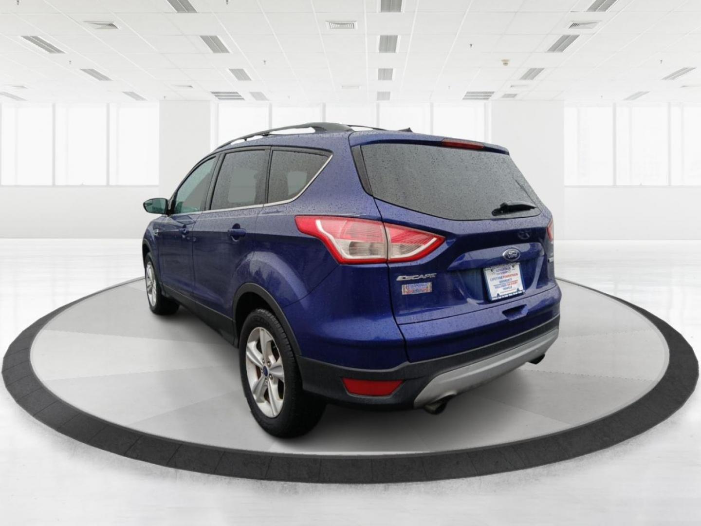 2013 Ford Escape SE FWD (1FMCU0G93DU) with an 2.0L L4 DOHC 16V engine, 6-Speed Automatic transmission, located at 880 E. National Road, OH, 45377, (937) 908-9800, 39.891918, -84.183975 - Photo#4