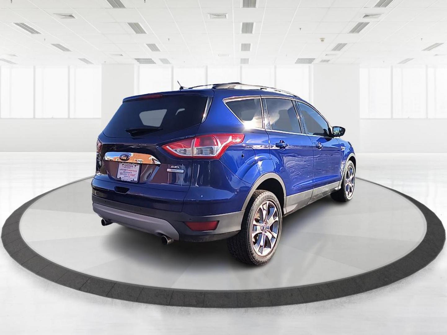 2013 Ford Escape SEL FWD (1FMCU0H99DU) with an 2.0L L4 DOHC 16V engine, 6-Speed Automatic transmission, located at 1099 N County Rd 25A , Troy, OH, 45373, (937) 908-9800, 40.057041, -84.215462 - Photo#2