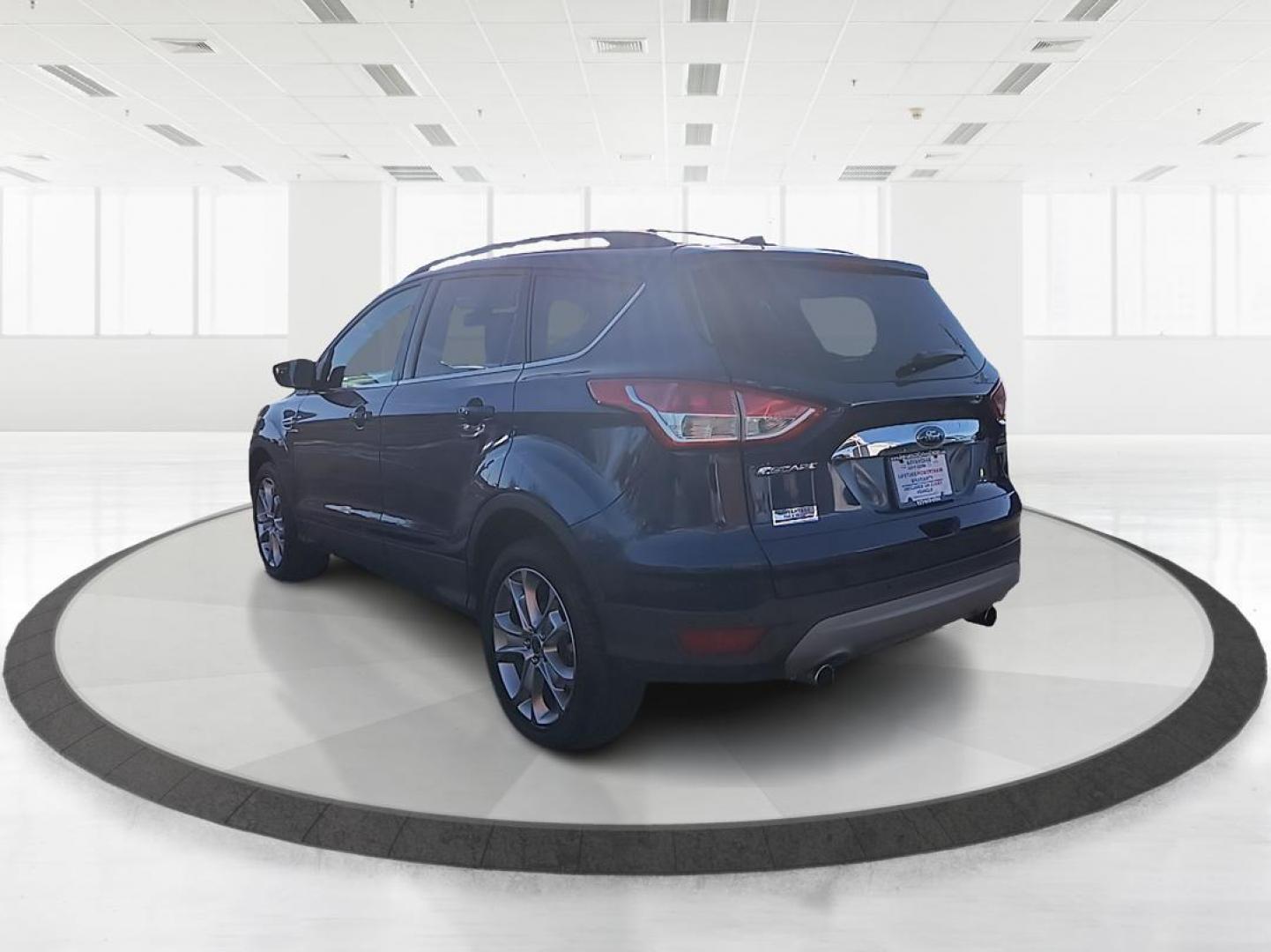 2013 Ford Escape SEL FWD (1FMCU0H99DU) with an 2.0L L4 DOHC 16V engine, 6-Speed Automatic transmission, located at 1099 N County Rd 25A , Troy, OH, 45373, (937) 908-9800, 40.057041, -84.215462 - Photo#4