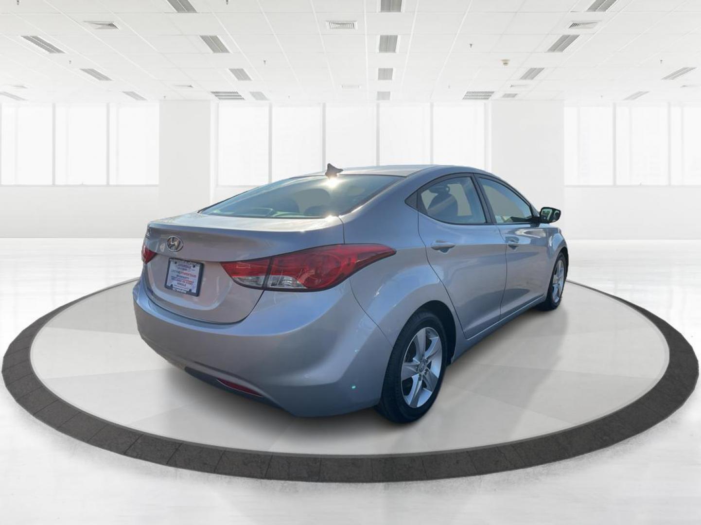 2013 Radiant Silver Metallic Hyundai Elantra GLS A/T (5NPDH4AEXDH) with an 1.8L L4 DOHC 16V engine, 6-Speed Automatic transmission, located at 1184 Kauffman Ave, Fairborn, OH, 45324, (937) 908-9800, 39.807072, -84.031563 - Photo#2