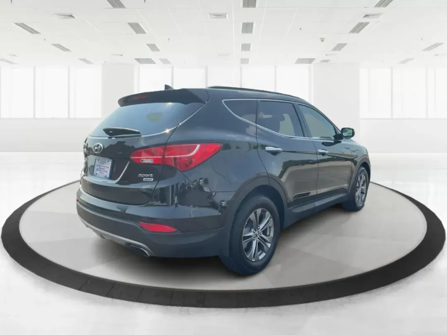 2013 Twilight Black Hyundai Santa Fe Sport 2.4 AWD (5XYZUDLB5DG) with an 2.4L L4 DOHC 16V engine, 6-Speed Automatic transmission, located at 1184 Kauffman Ave, Fairborn, OH, 45324, (937) 908-9800, 39.807072, -84.031563 - Photo#2