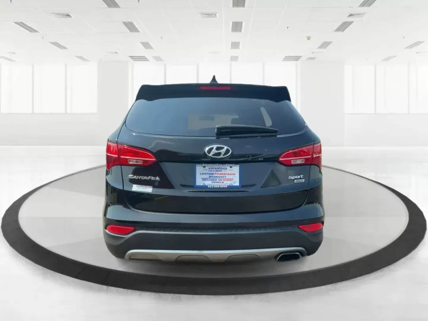 2013 Twilight Black Hyundai Santa Fe Sport 2.4 AWD (5XYZUDLB5DG) with an 2.4L L4 DOHC 16V engine, 6-Speed Automatic transmission, located at 1184 Kauffman Ave, Fairborn, OH, 45324, (937) 908-9800, 39.807072, -84.031563 - Photo#3