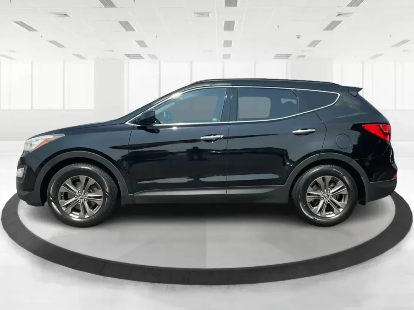 2013 Twilight Black Hyundai Santa Fe Sport 2.4 AWD (5XYZUDLB5DG) with an 2.4L L4 DOHC 16V engine, 6-Speed Automatic transmission, located at 1184 Kauffman Ave, Fairborn, OH, 45324, (937) 908-9800, 39.807072, -84.031563 - Photo#5