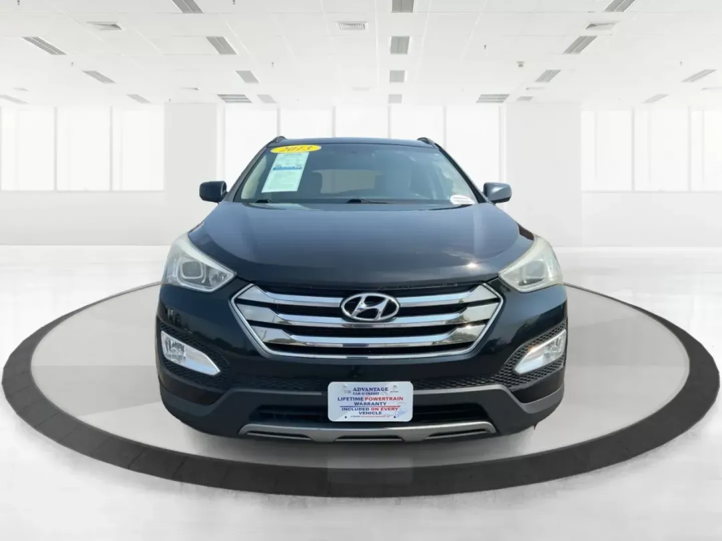 2013 Twilight Black Hyundai Santa Fe Sport 2.4 AWD (5XYZUDLB5DG) with an 2.4L L4 DOHC 16V engine, 6-Speed Automatic transmission, located at 1184 Kauffman Ave, Fairborn, OH, 45324, (937) 908-9800, 39.807072, -84.031563 - Photo#6