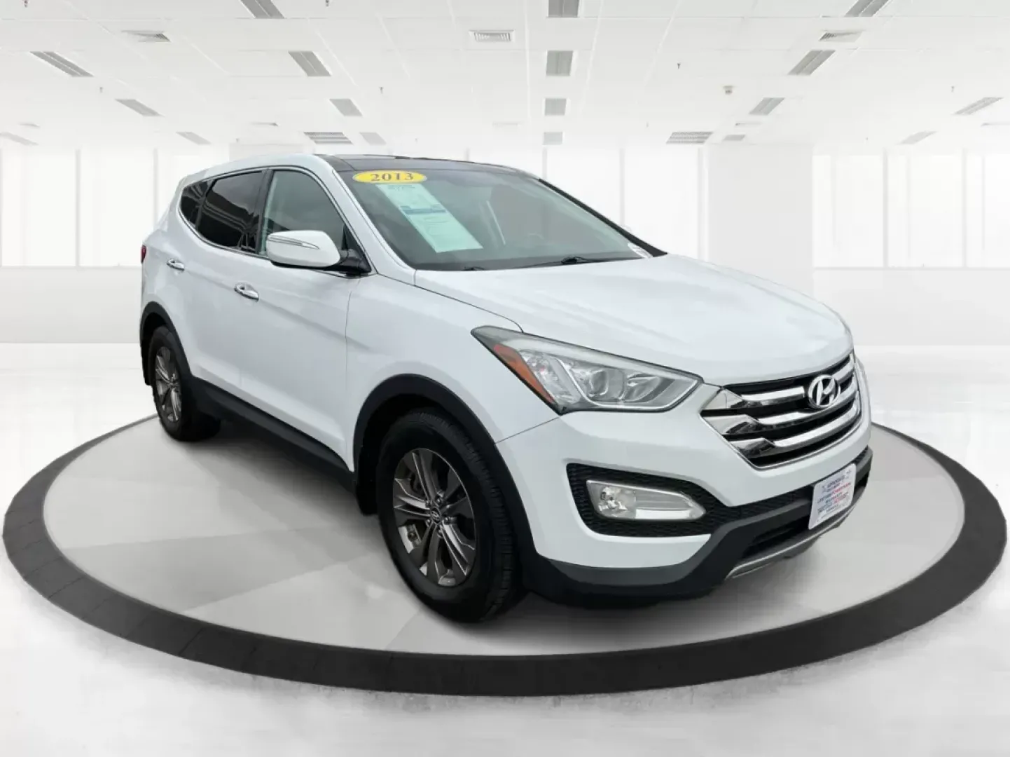 2013 Hyundai Santa Fe Sport (5XYZU3LB9DG) with an Theta II 2.4L I-4 gasoline direct injection engine, located at 1184 Kauffman Ave, Fairborn, OH, 45324, (937) 908-9800, 39.807072, -84.031563 - Photo#0