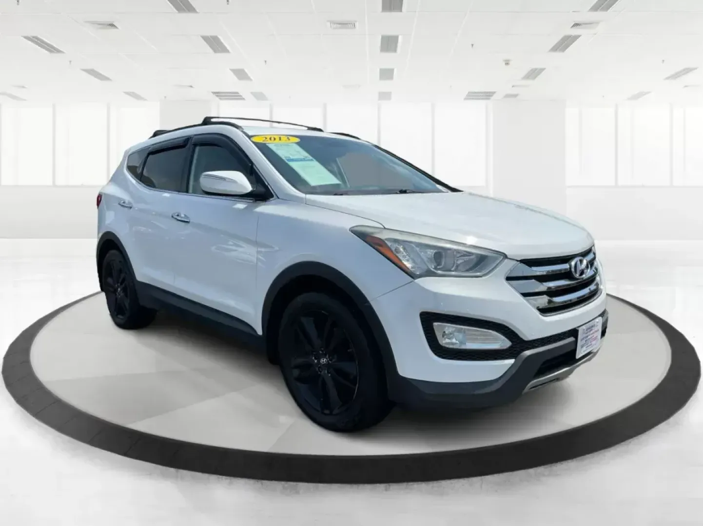 2013 Hyundai Santa Fe Sport 2.0T (5XYZUDLA1DG) with an Theta II 2L I-4 gasoline direct injection engine, located at 880 E. National Road, OH, 45377, (937) 908-9800, 39.891918, -84.183975 - Photo#0