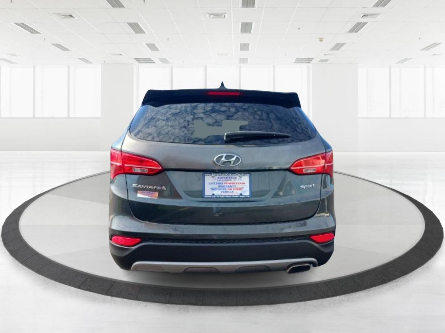 2013 Hyundai Santa Fe Sport 2.4 FWD (5XYZU3LB8DG) with an 2.4L L4 DOHC 16V engine, 6-Speed Automatic transmission, located at 4508 South Dixie Dr, Moraine, OH, 45439, (937) 908-9800, 39.807072, -84.031563 - Photo#2