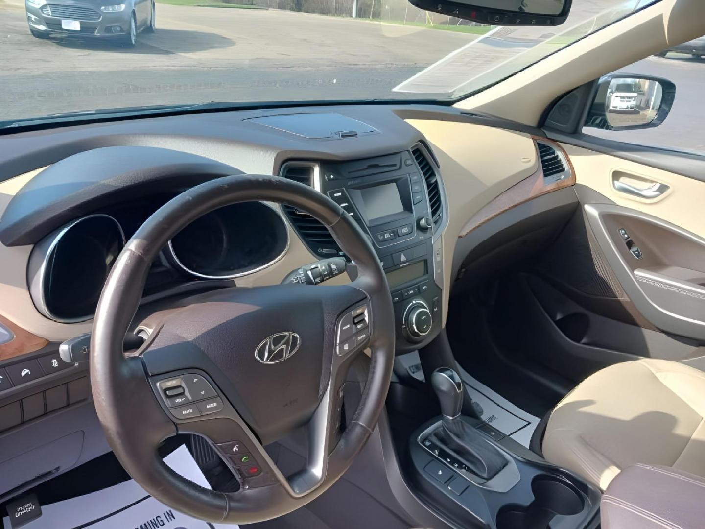2013 Hyundai Santa Fe Sport 2.4 FWD (5XYZU3LB8DG) with an 2.4L L4 DOHC 16V engine, 6-Speed Automatic transmission, located at 4508 South Dixie Dr, Moraine, OH, 45439, (937) 908-9800, 39.807072, -84.031563 - Photo#6