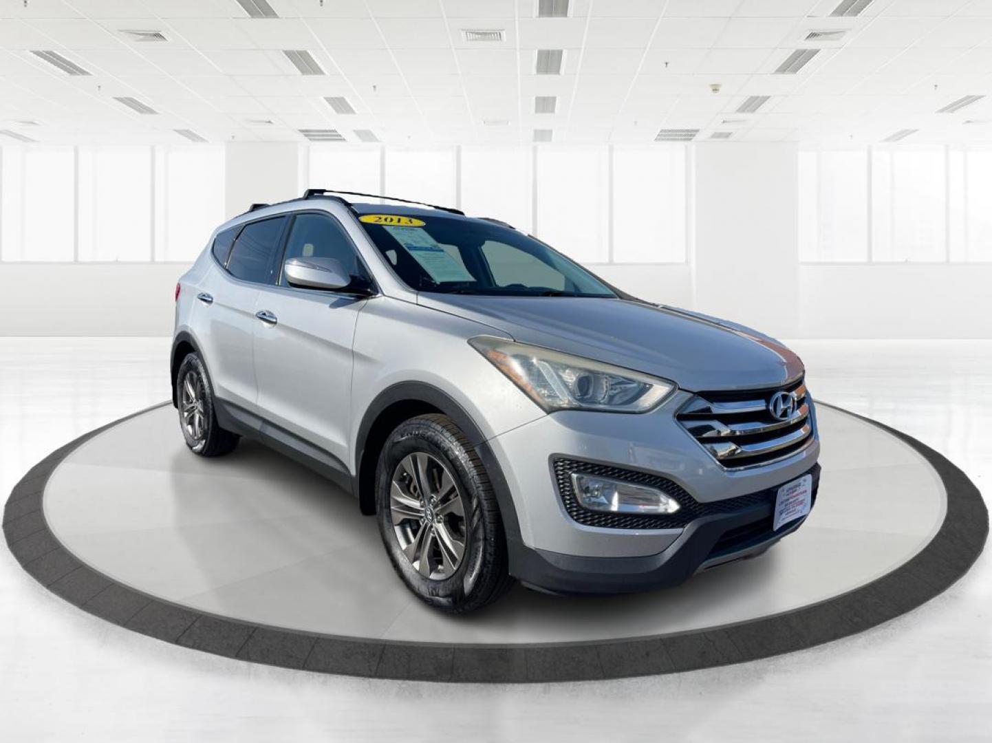 2013 Hyundai Santa Fe Sport (5XYZUDLB0DG) with an Theta II 2.4L I-4 gasoline direct injection engine, located at 401 Woodman Dr, Riverside, OH, 45431, (937) 908-9800, 39.761024, -84.120956 - Photo#0