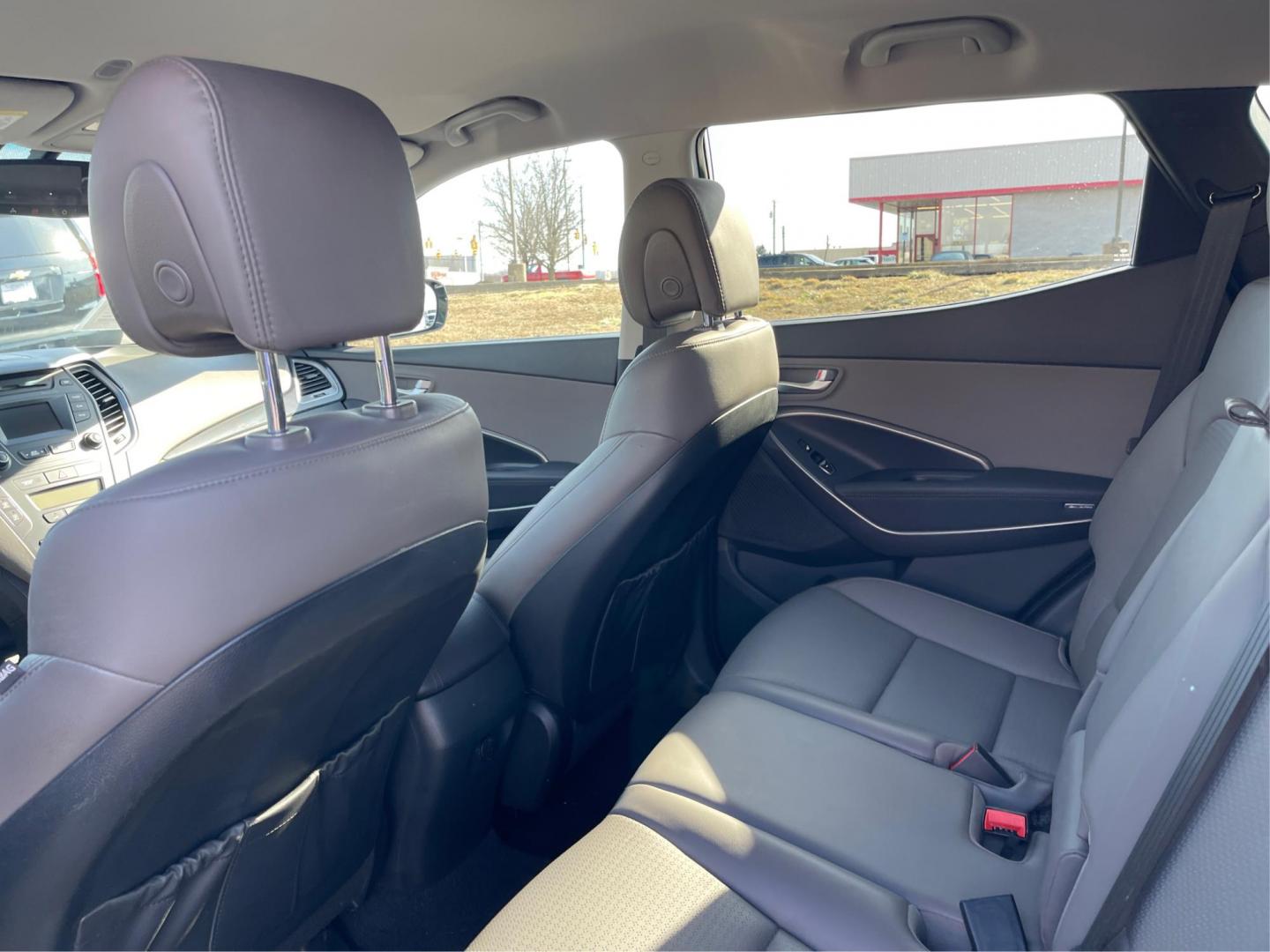 2013 Hyundai Santa Fe Sport (5XYZUDLB0DG) with an Theta II 2.4L I-4 gasoline direct injection engine, located at 401 Woodman Dr, Riverside, OH, 45431, (937) 908-9800, 39.761024, -84.120956 - Photo#9