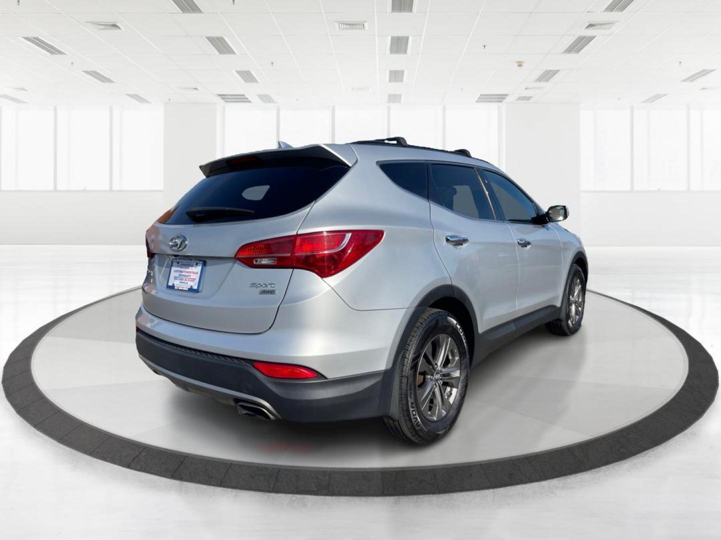 2013 Hyundai Santa Fe Sport (5XYZUDLB0DG) with an Theta II 2.4L I-4 gasoline direct injection engine, located at 401 Woodman Dr, Riverside, OH, 45431, (937) 908-9800, 39.761024, -84.120956 - Photo#2