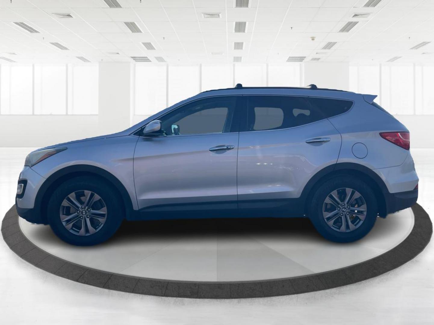 2013 Hyundai Santa Fe Sport (5XYZUDLB0DG) with an Theta II 2.4L I-4 gasoline direct injection engine, located at 401 Woodman Dr, Riverside, OH, 45431, (937) 908-9800, 39.761024, -84.120956 - Photo#5