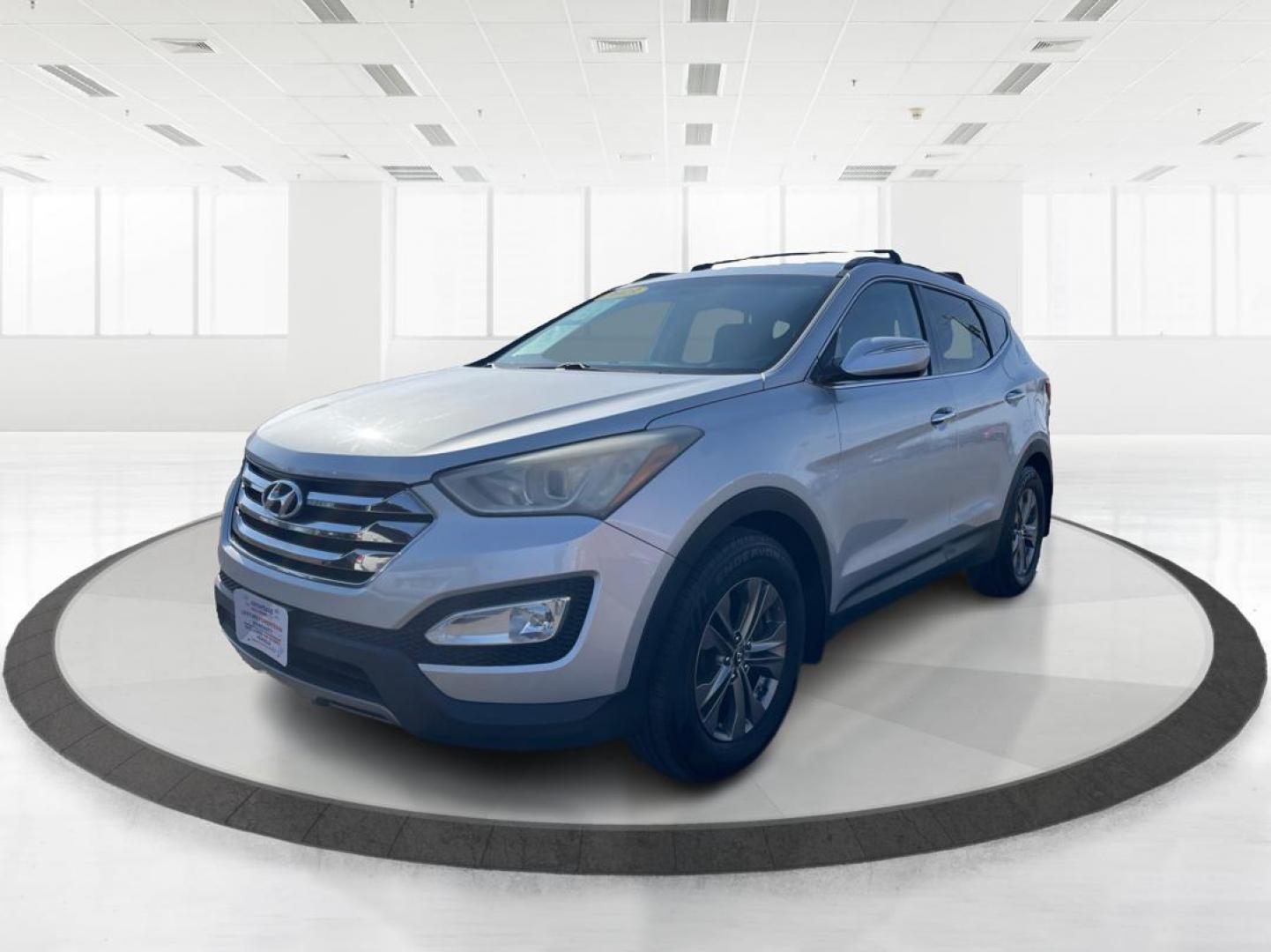 2013 Hyundai Santa Fe Sport (5XYZUDLB0DG) with an Theta II 2.4L I-4 gasoline direct injection engine, located at 401 Woodman Dr, Riverside, OH, 45431, (937) 908-9800, 39.761024, -84.120956 - Photo#7