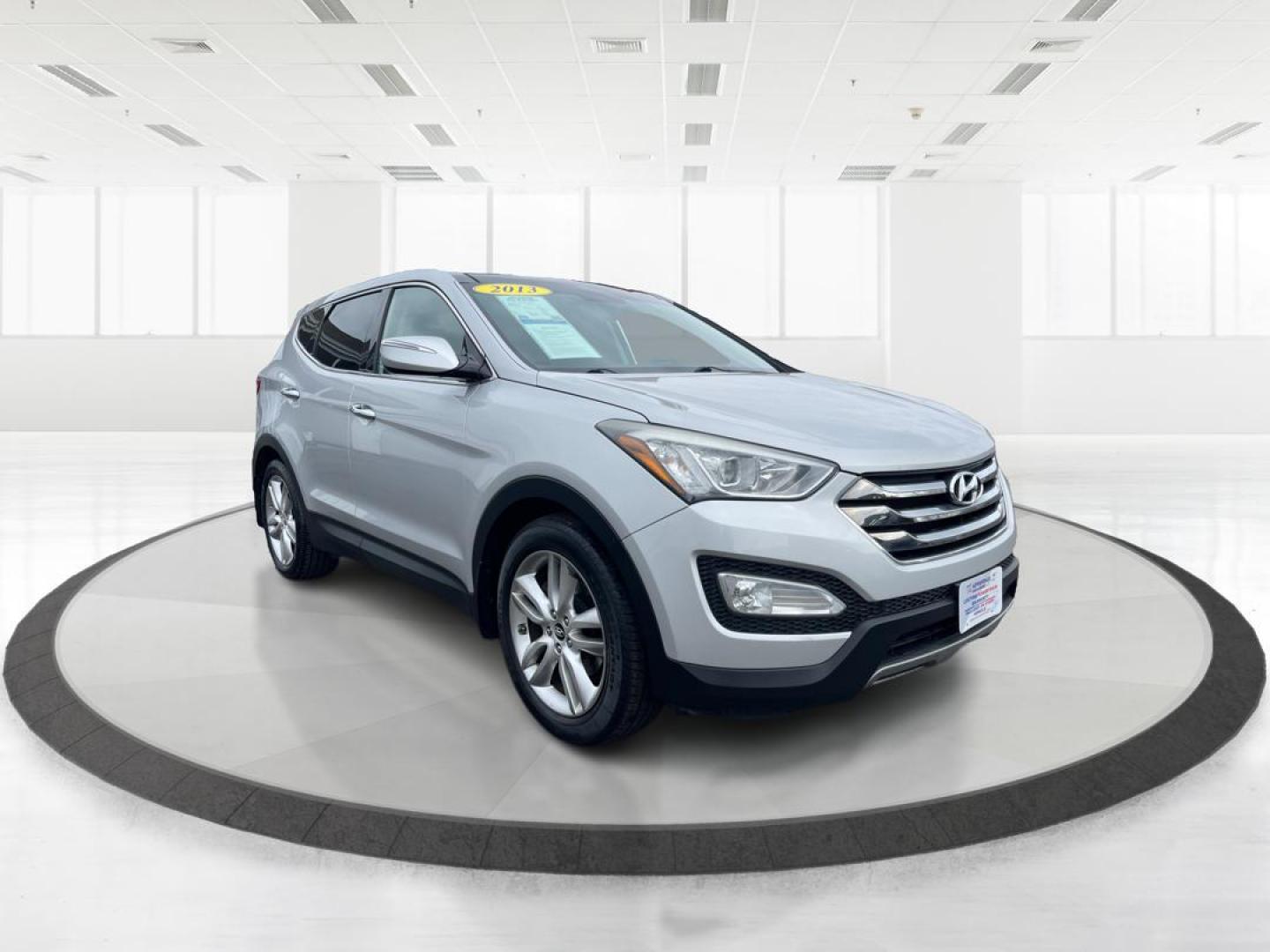 2013 Hyundai Santa Fe Sport 2.0T (5XYZW3LA3DG) with an Theta II 2L I-4 gasoline direct injection engine, located at 401 Woodman Dr, Riverside, OH, 45431, (937) 908-9800, 39.761024, -84.120956 - Photo#0