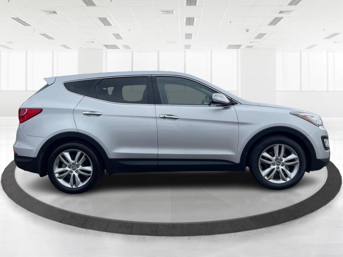 2013 Hyundai Santa Fe Sport 2.0T (5XYZW3LA3DG) with an Theta II 2L I-4 gasoline direct injection engine, located at 401 Woodman Dr, Riverside, OH, 45431, (937) 908-9800, 39.761024, -84.120956 - Photo#1