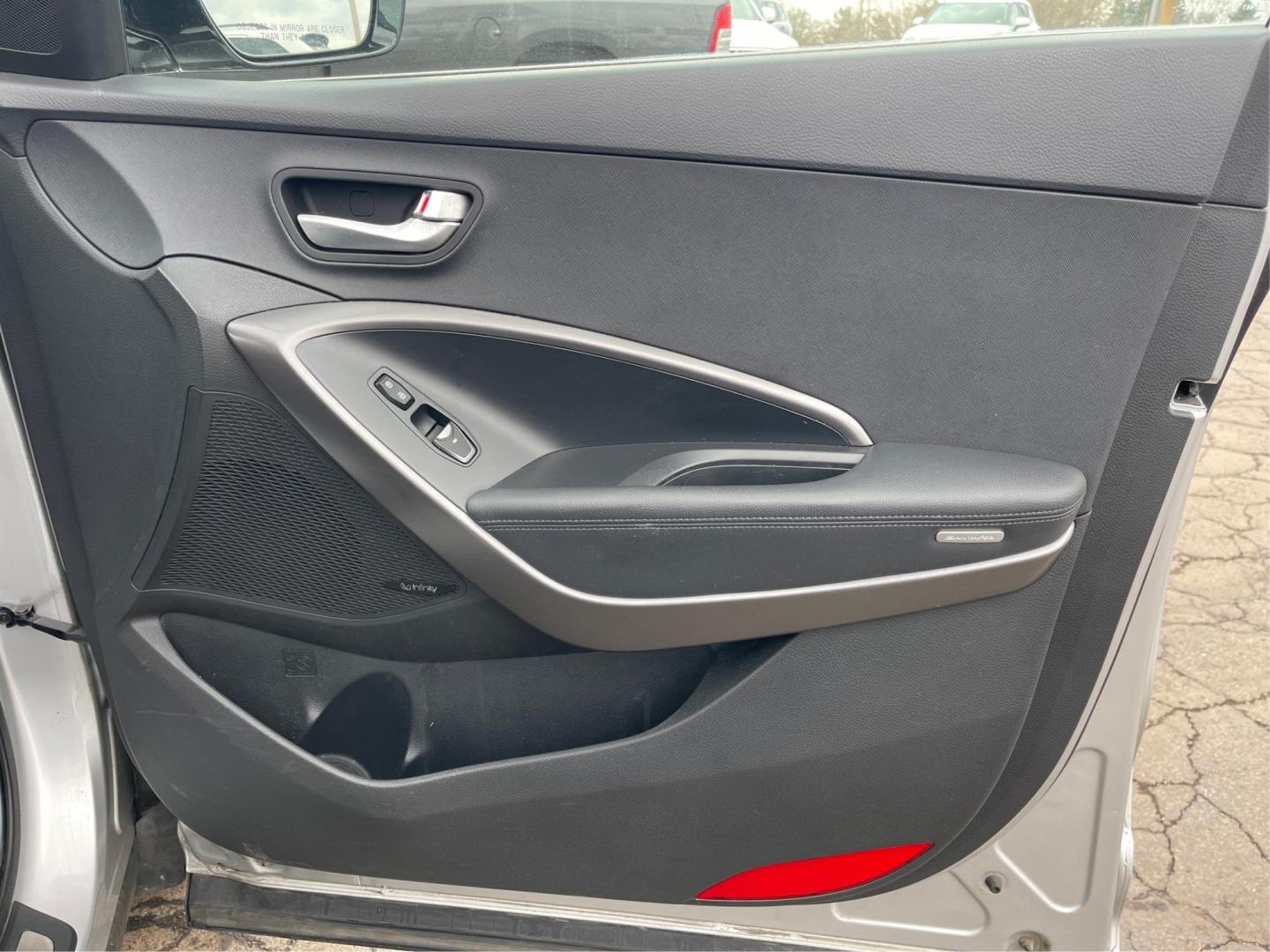 2013 Hyundai Santa Fe Sport 2.0T (5XYZW3LA3DG) with an Theta II 2L I-4 gasoline direct injection engine, located at 401 Woodman Dr, Riverside, OH, 45431, (937) 908-9800, 39.761024, -84.120956 - Photo#19