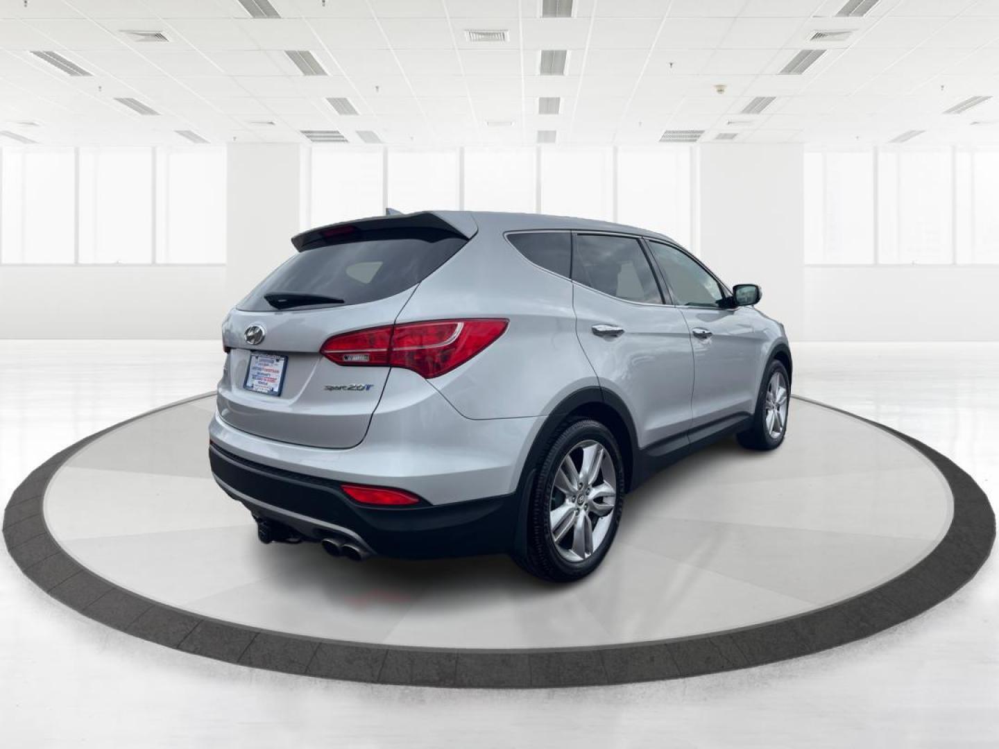 2013 Hyundai Santa Fe Sport 2.0T (5XYZW3LA3DG) with an Theta II 2L I-4 gasoline direct injection engine, located at 401 Woodman Dr, Riverside, OH, 45431, (937) 908-9800, 39.761024, -84.120956 - Photo#2